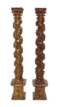 A Pair of Continental Painted and Gilt Solomonic Columns, Height 26 1/4 inches.