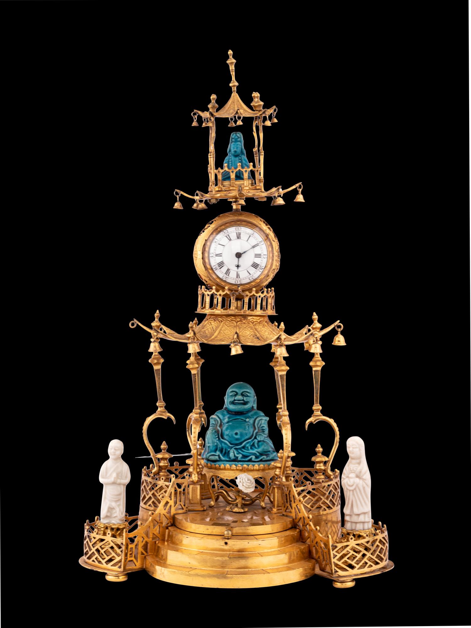 A Louis XV Style Gilt Bronze and Chinese Porcelain Mounted Pagoda-Form Mantel Clock