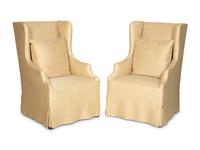 A Pair of Linen-Upholstered Wingback Slip Covered Chairs