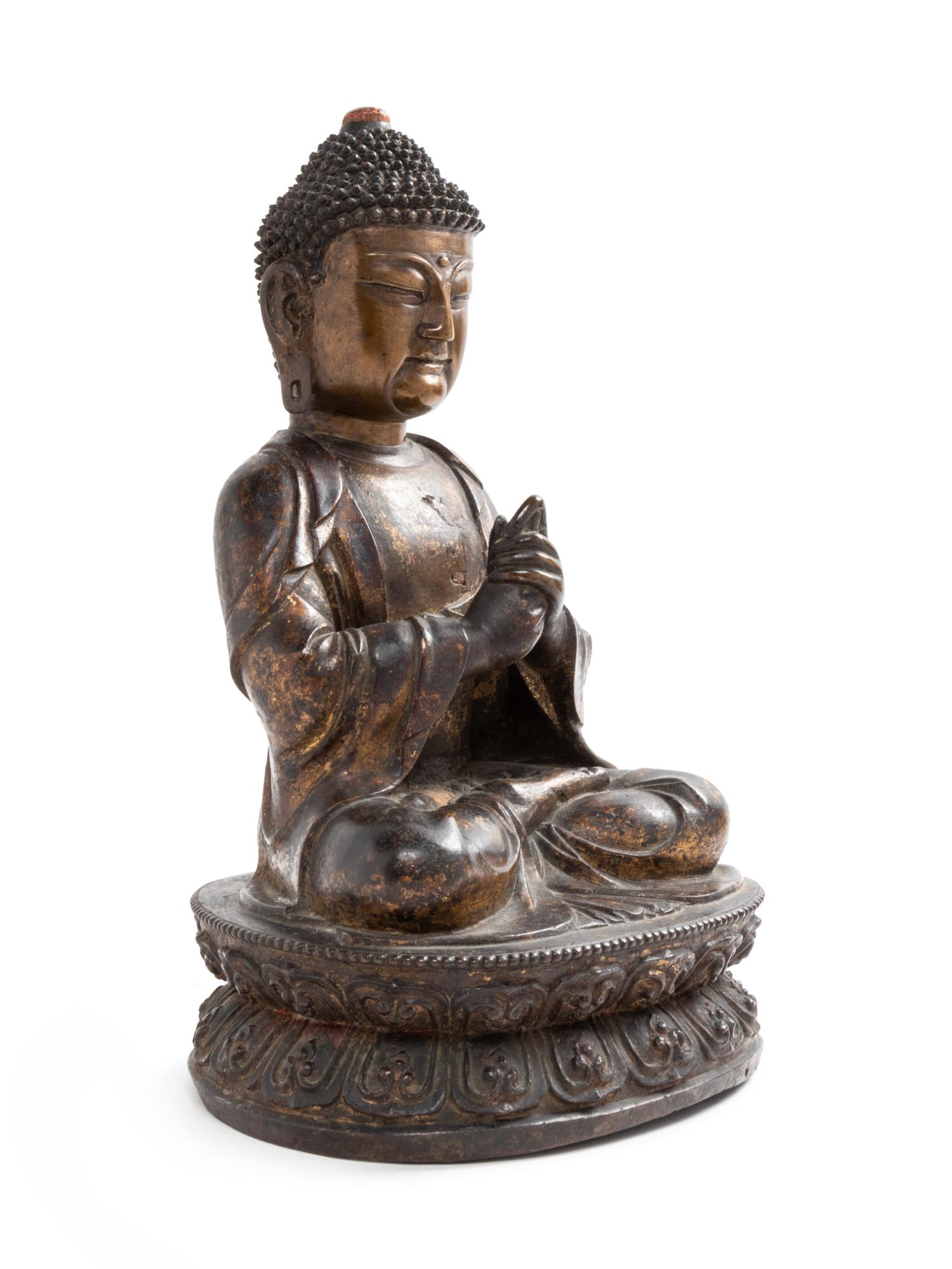 A Chinese Bronze Seated Buddha