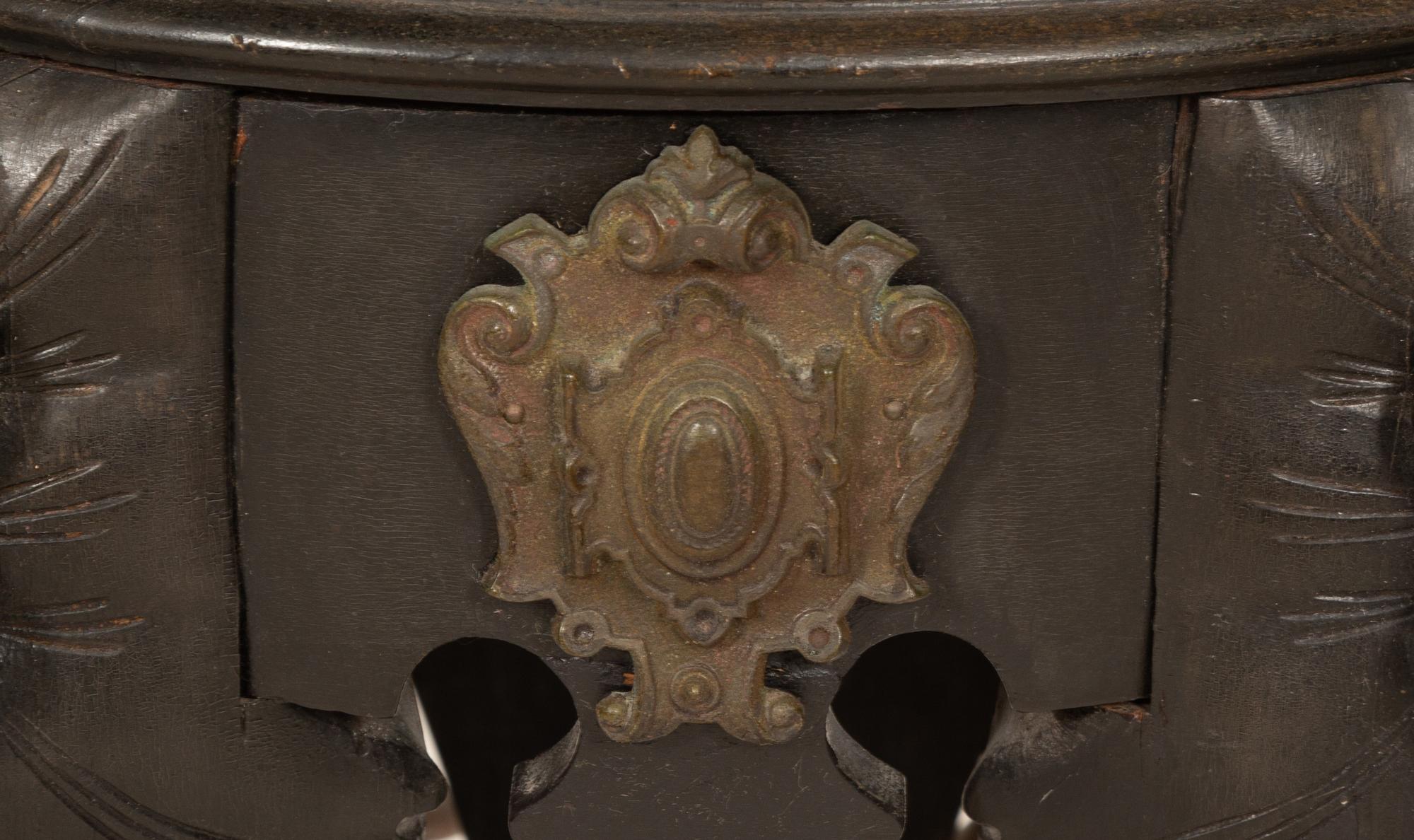 An Anglo-Indian Carved Ebonized Elephant Table