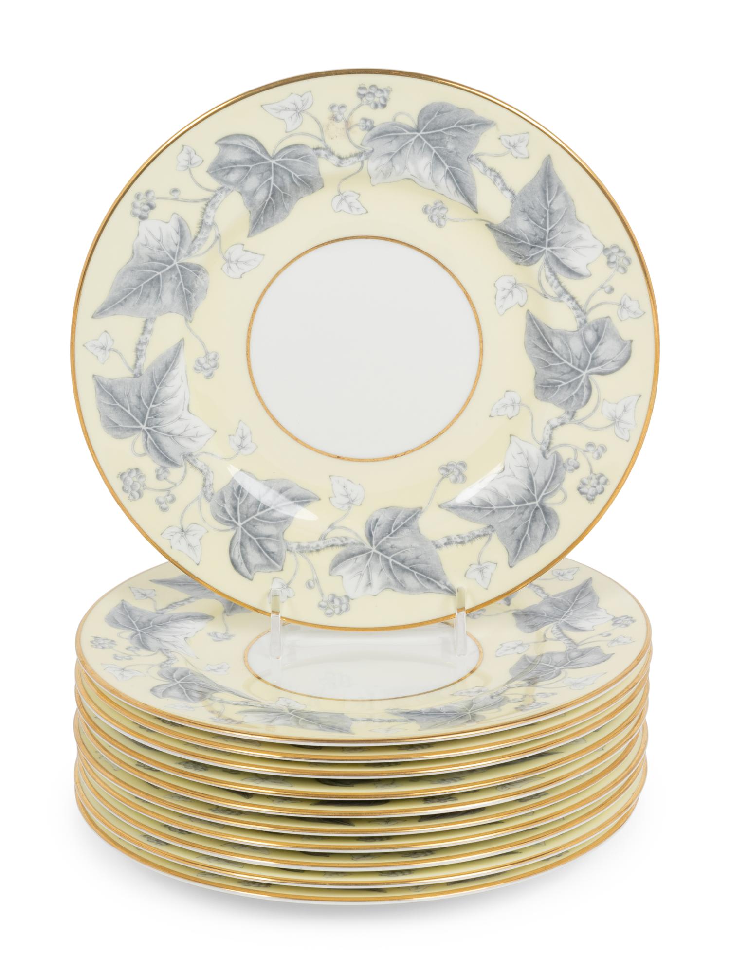 A Set of Twelve Royal Worcester Porcelain Chargers and Eleven Similar Wedgwood Porcelain Salad Plates