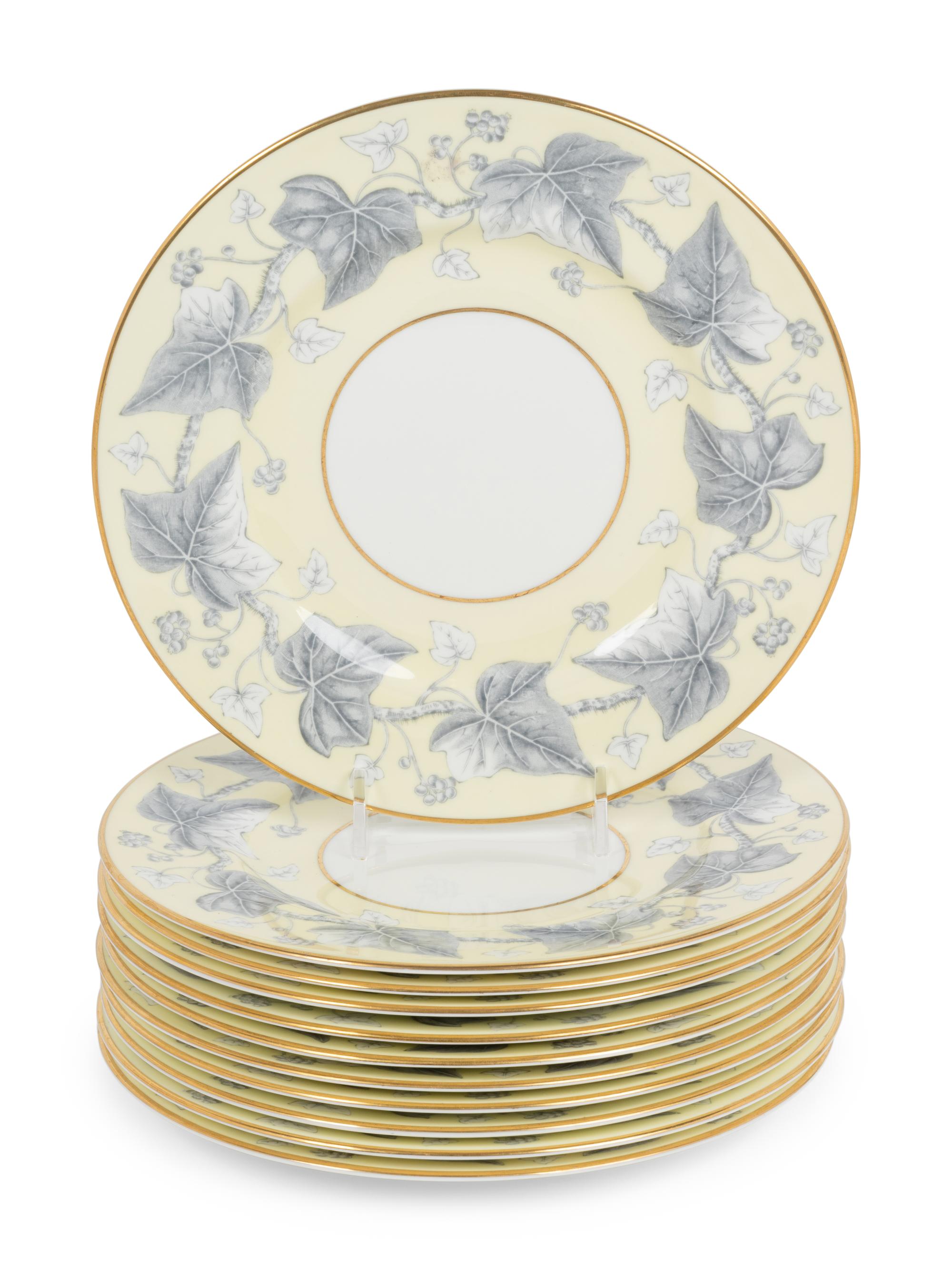 A Set of Twelve Royal Worcester Porcelain Chargers and Eleven Similar Wedgwood Porcelain Salad Plates