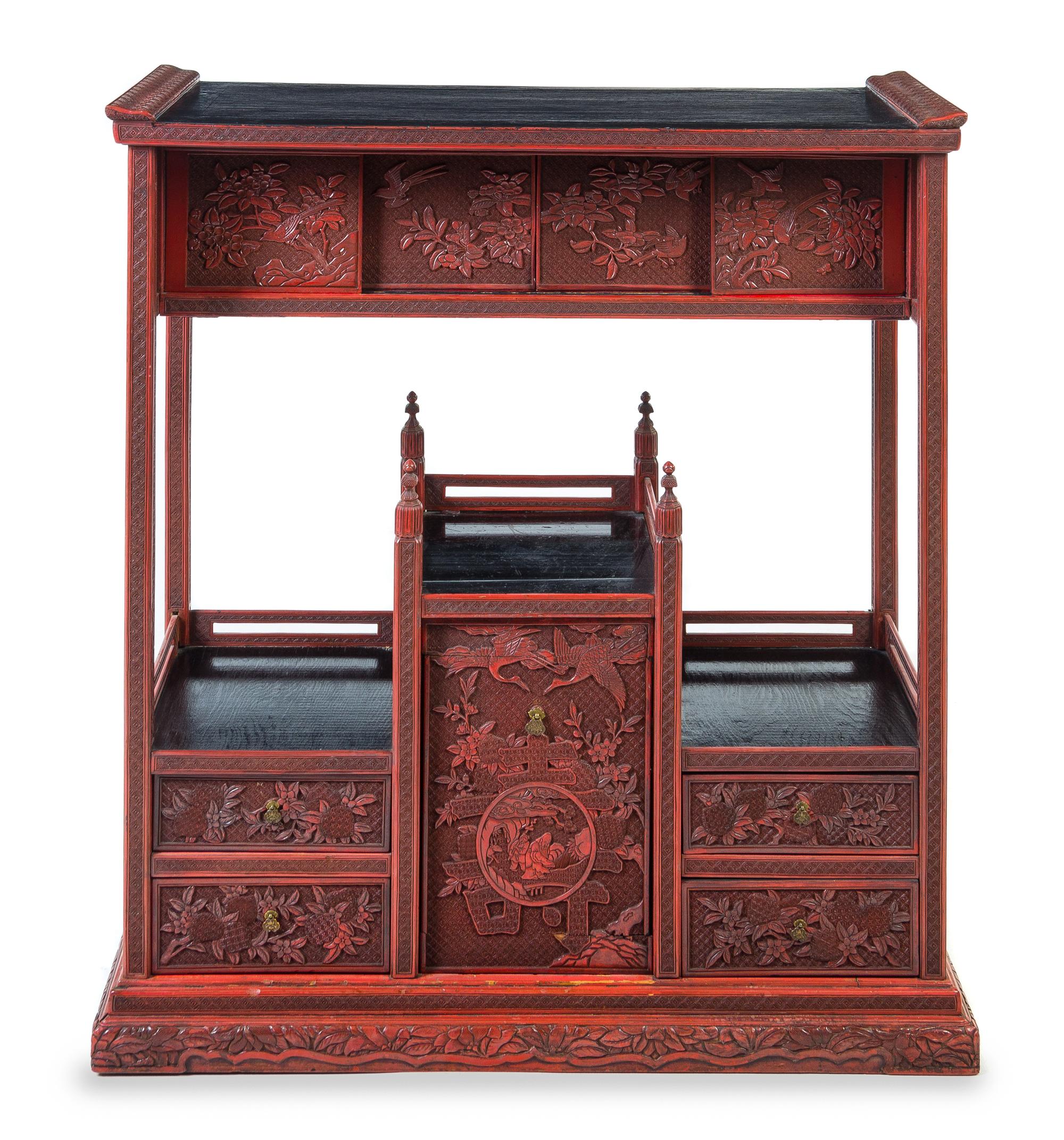 A Chinese Cinnabar Lacquer Display Cabinet Height 35 1/4 x length 31 3/4 x depth 13 1/4 inches.
