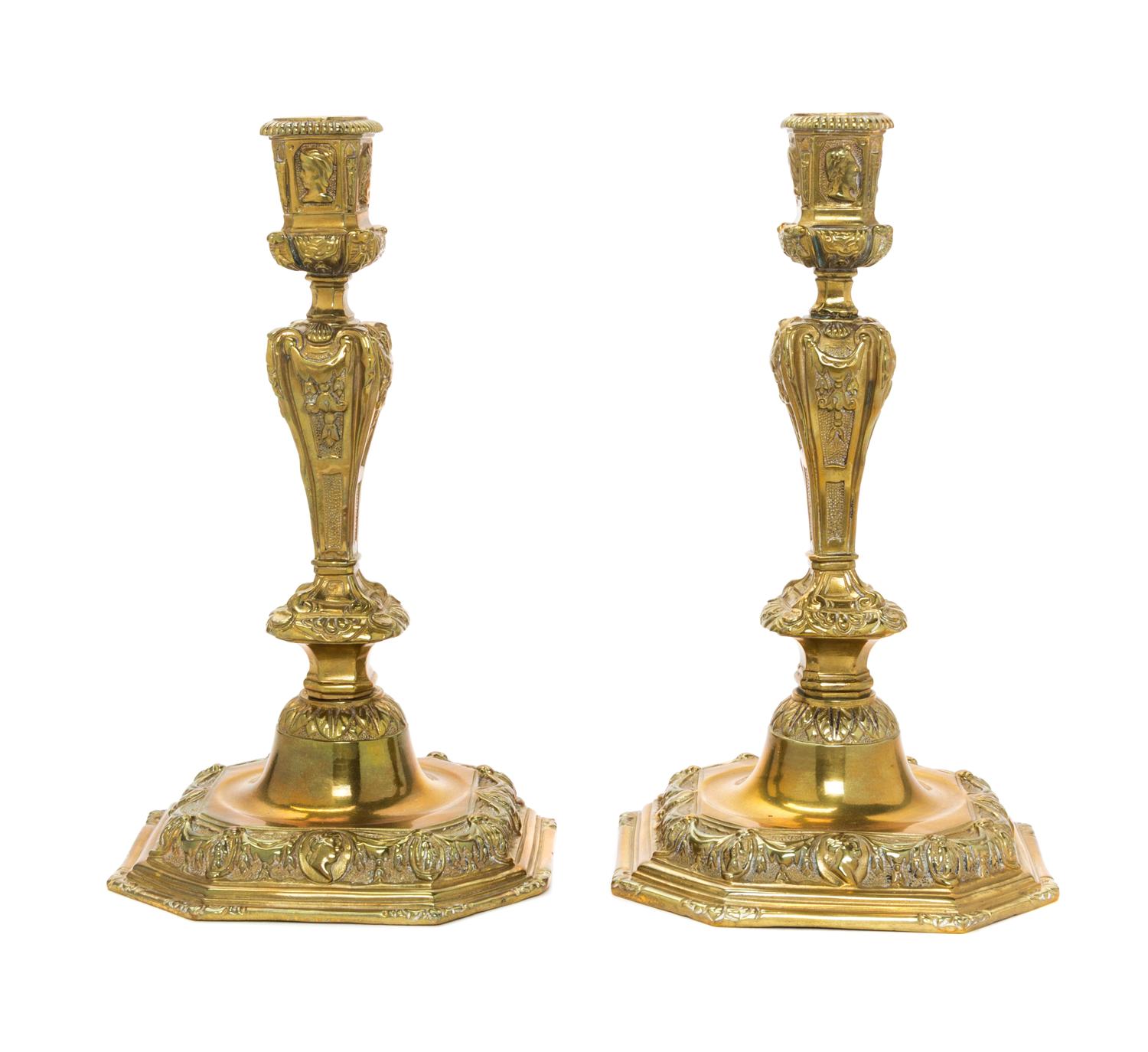 A Pair of Neoclassical Style Brass Candlesticks Height 9 inches.