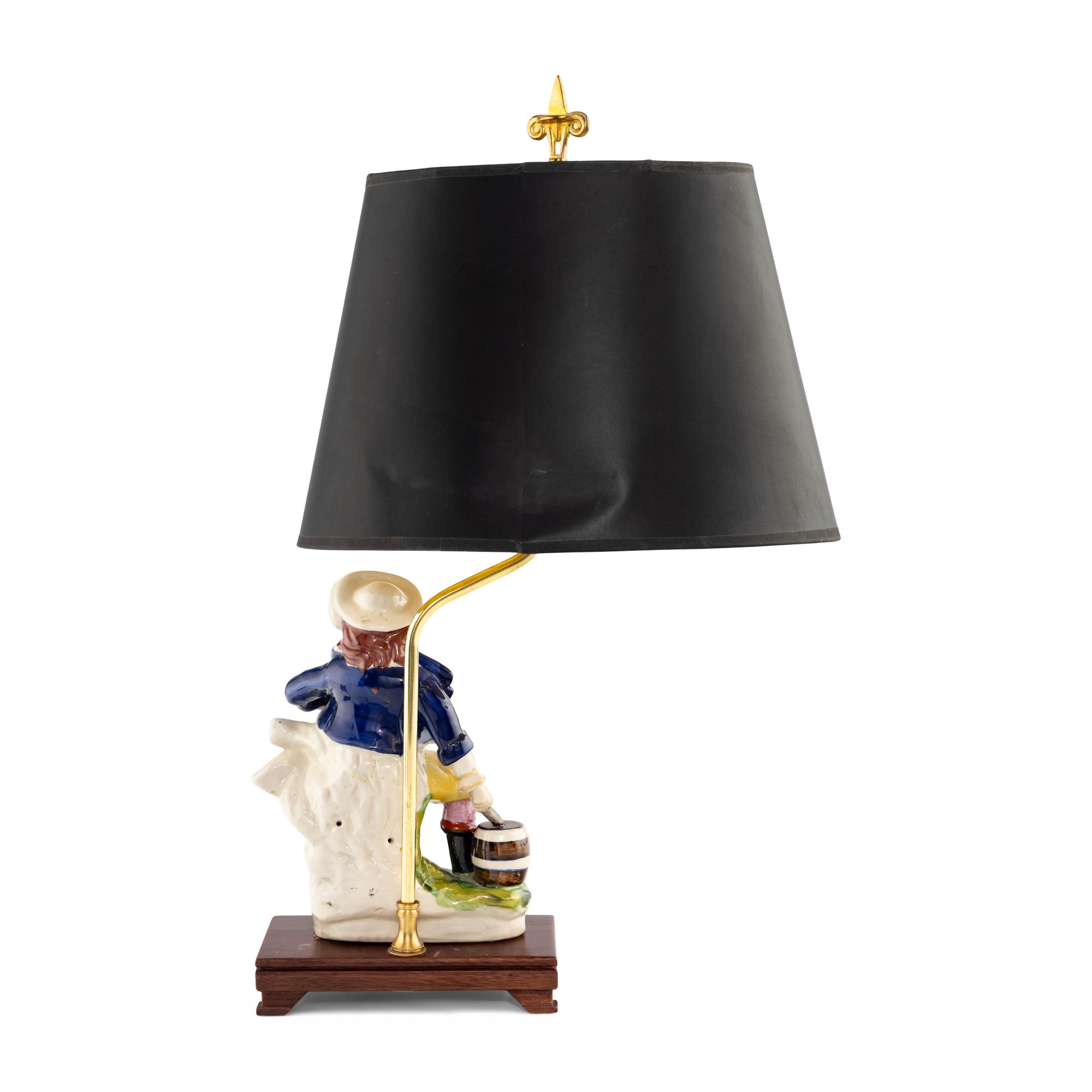 A Polychrome Glazed Pottery Figure Mounted as a Lamp