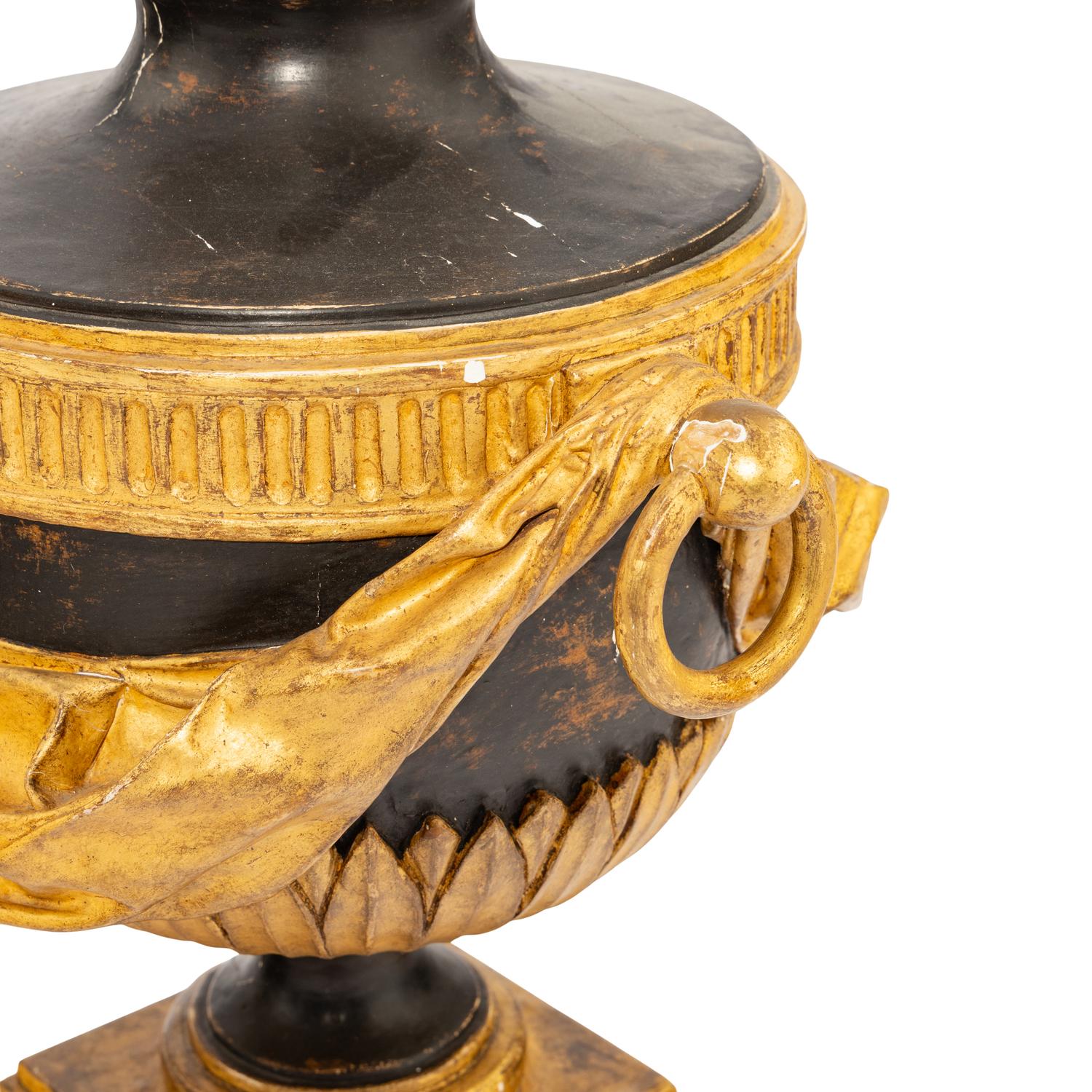 A Pair of Neoclassical Style Painted and Parcel Giltwood Flaming Urns
