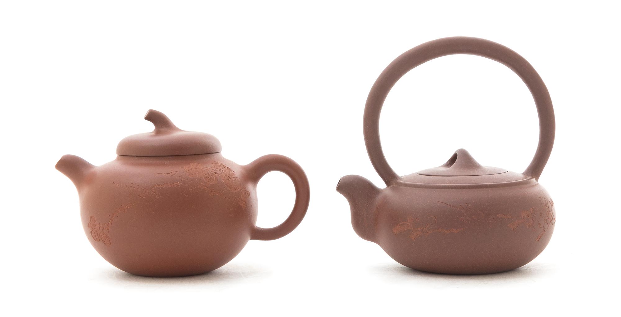 Two Yixing Pottery Teapots Height of taller 4 3/4 inches.