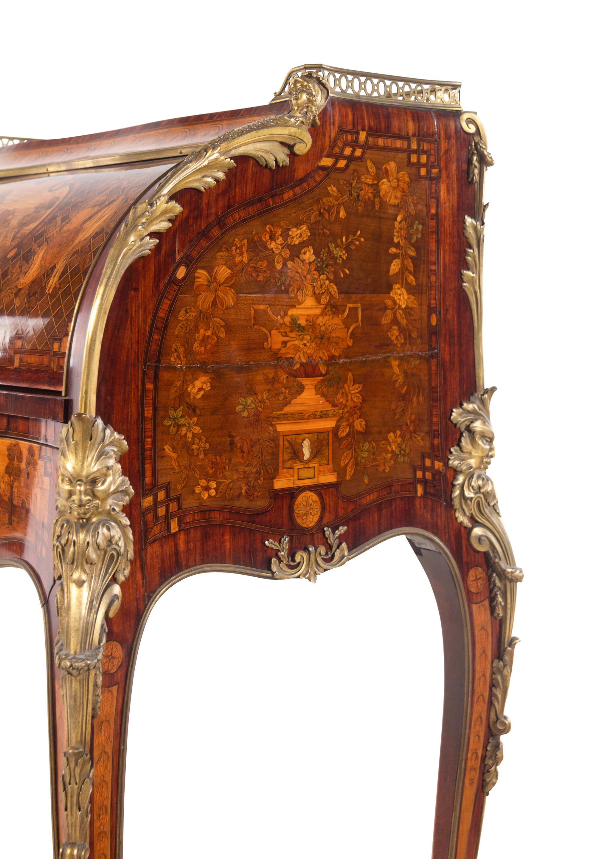 A Louis XV Style Gilt Bronze Mounted Marquetry Cylinder Bureau