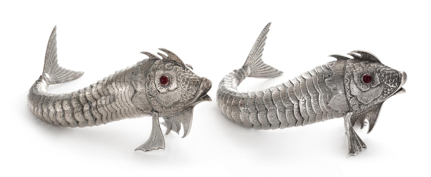 A Pair of Spanish Silver Models of Fish, Maker's Mark M.G., 20th Century, each having a fully articulated body with red-glass inset eye