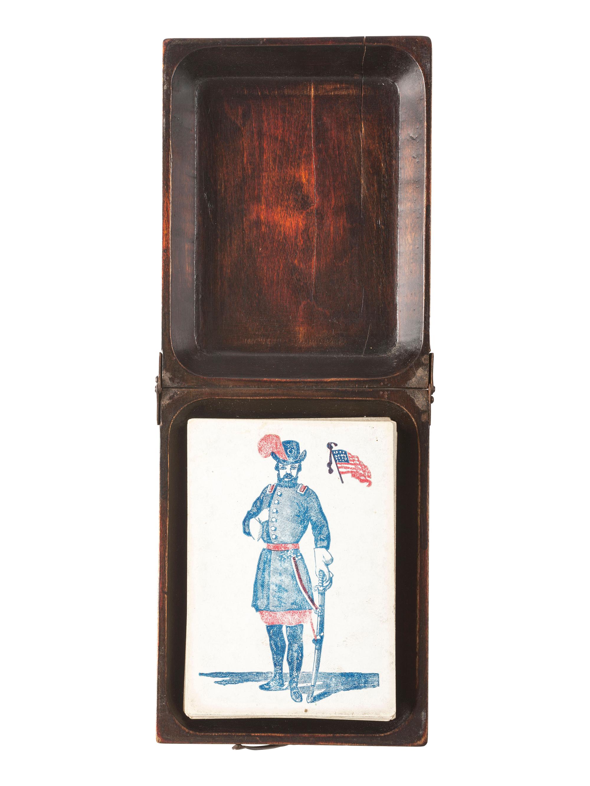 [CIVIL WAR]. Union playing cards housed in Civil War soldier's folk art carved case.