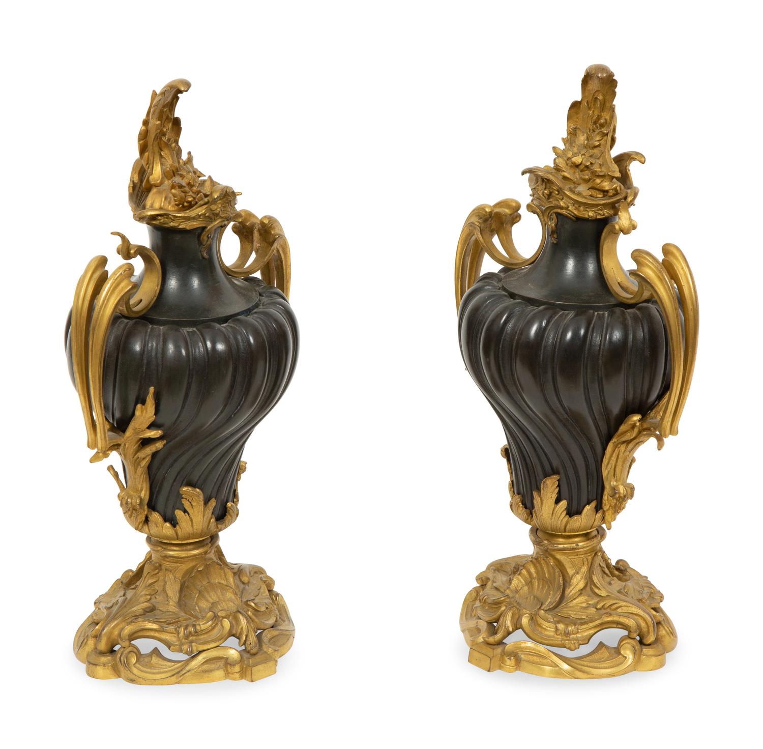 A Pair of French Gilt and Patinated Bronze Urns