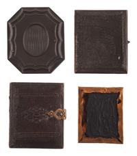 [EARLY PHOTOGRAPHY]. A group of 33 daguerreotypes, ambrotypes, tintypes, and CDVs of men of varying ages, including:
