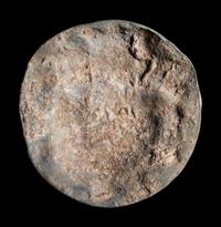 A Roman Bronze Roundel with Head of a Gorgon