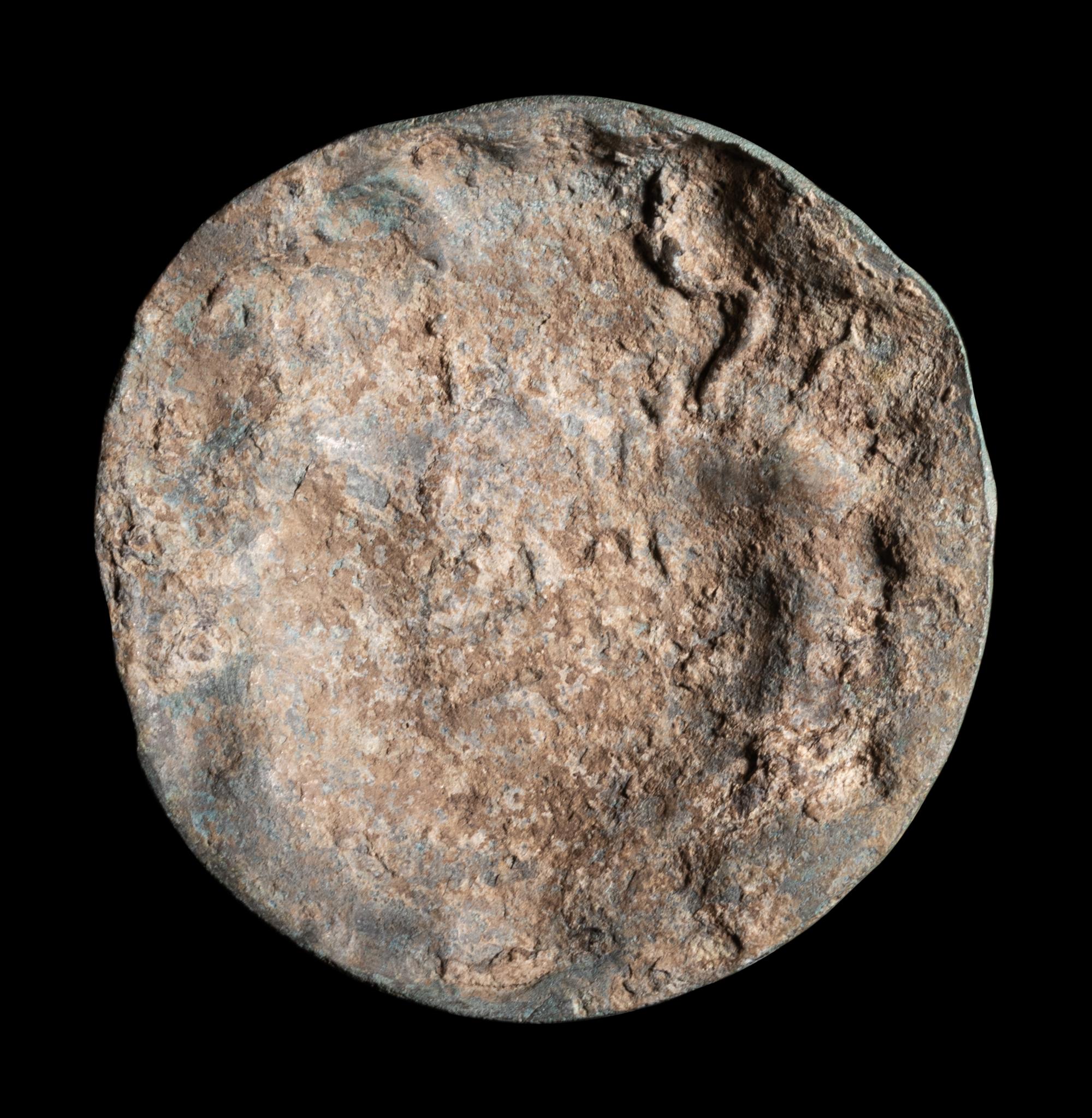 A Roman Bronze Roundel with Head of a Gorgon