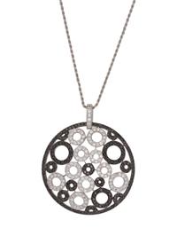 An 18 Karat White Gold, Black Diamond and Diamond Pendant/Necklace,