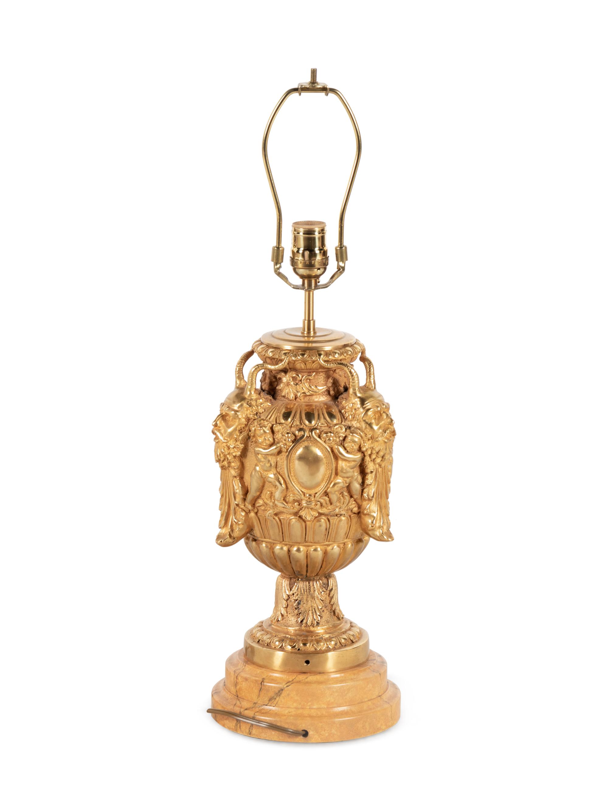 A Neoclassical Gilt Bronze Mask-Decorated Urn