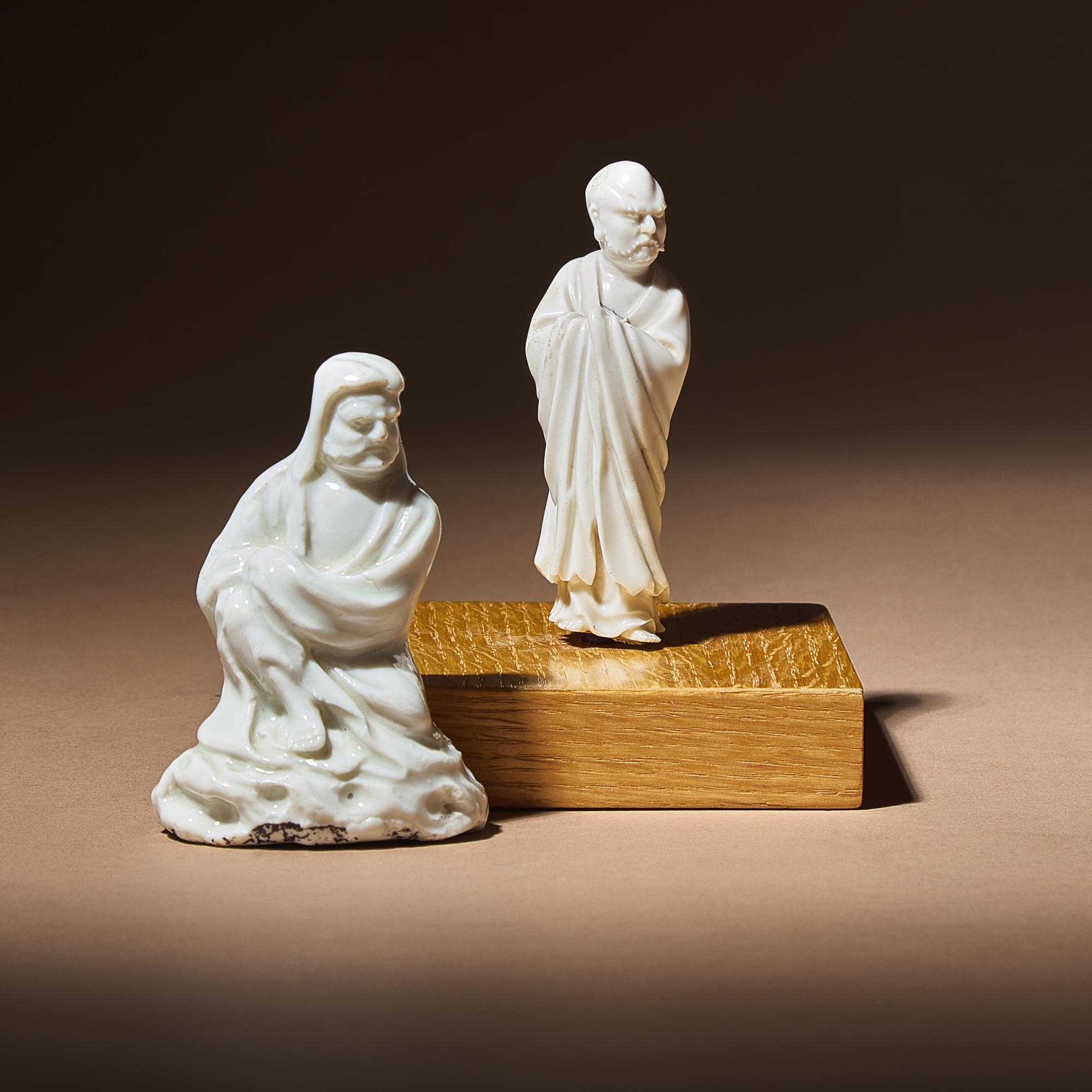 Two Small Chinese Blanc-de-Chine Porcelain Figures, Qing Dynasty — 清 德化白瓷羅漢坐像及達摩立像