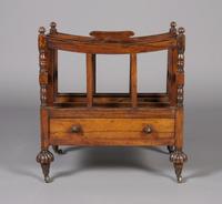 An English Mahogany Canterbury, Height 21 3/4 x width 20 x depth 14 3/4 inches.
