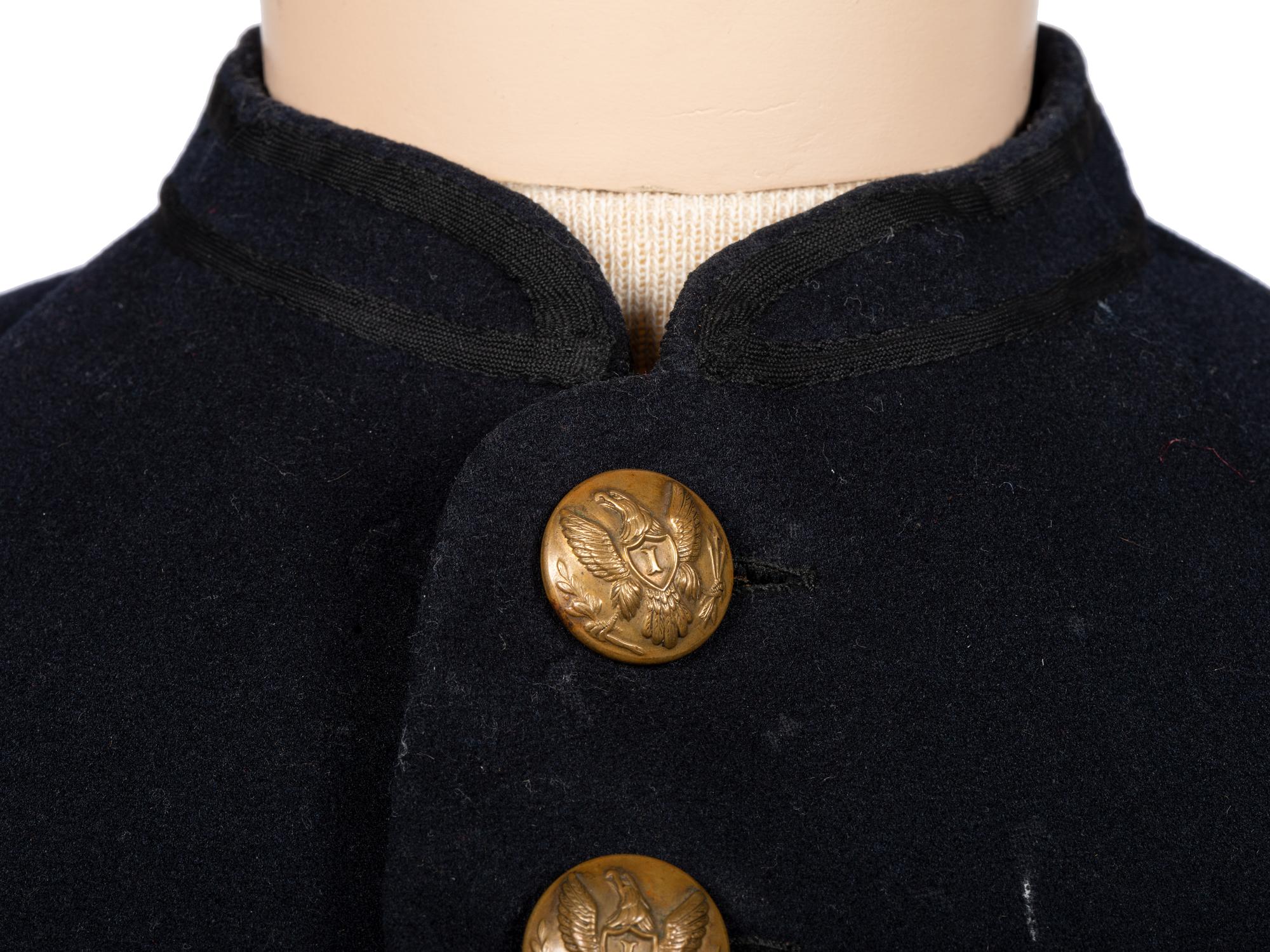 [CIVIL WAR]. Enlisted frock coat identified to Private Charles A. Fisk, 11th Massachusetts Infantry, WIA at Gettysburg.