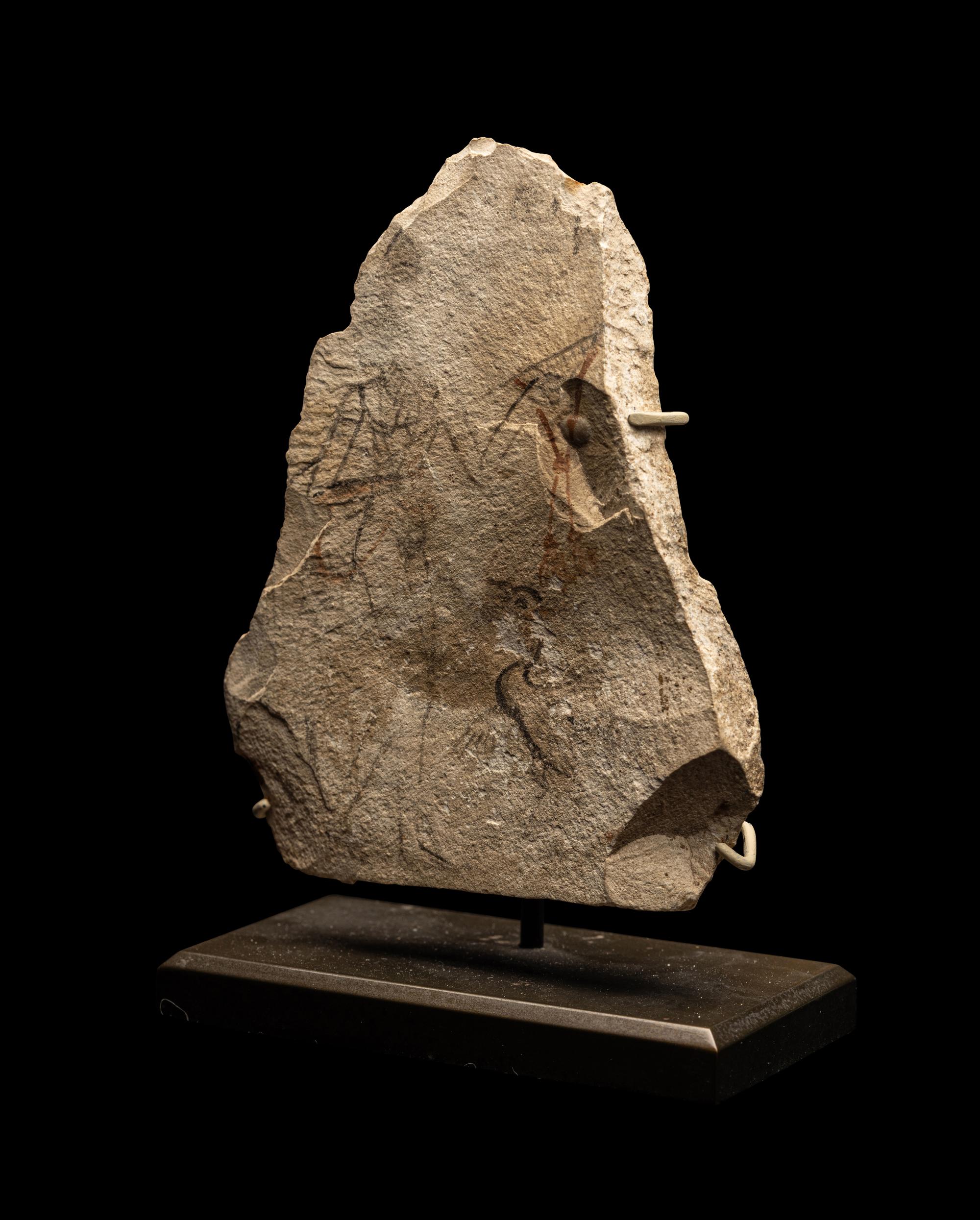 An Egyptian Limestone Ostracon with a Female Musician and Singing Goose