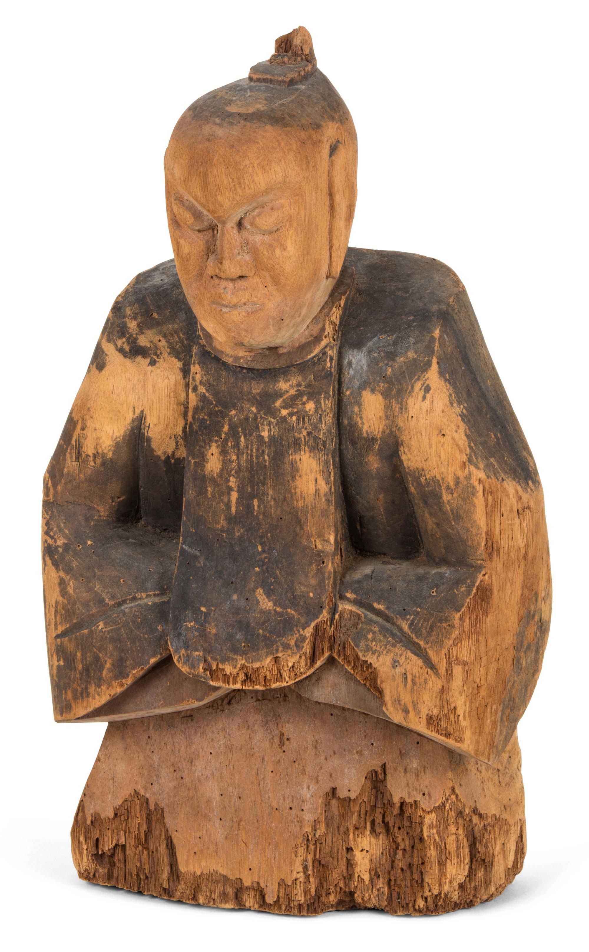 A Chinese Carved Hardwood Figure Height of tallest 14 1/4 inches.