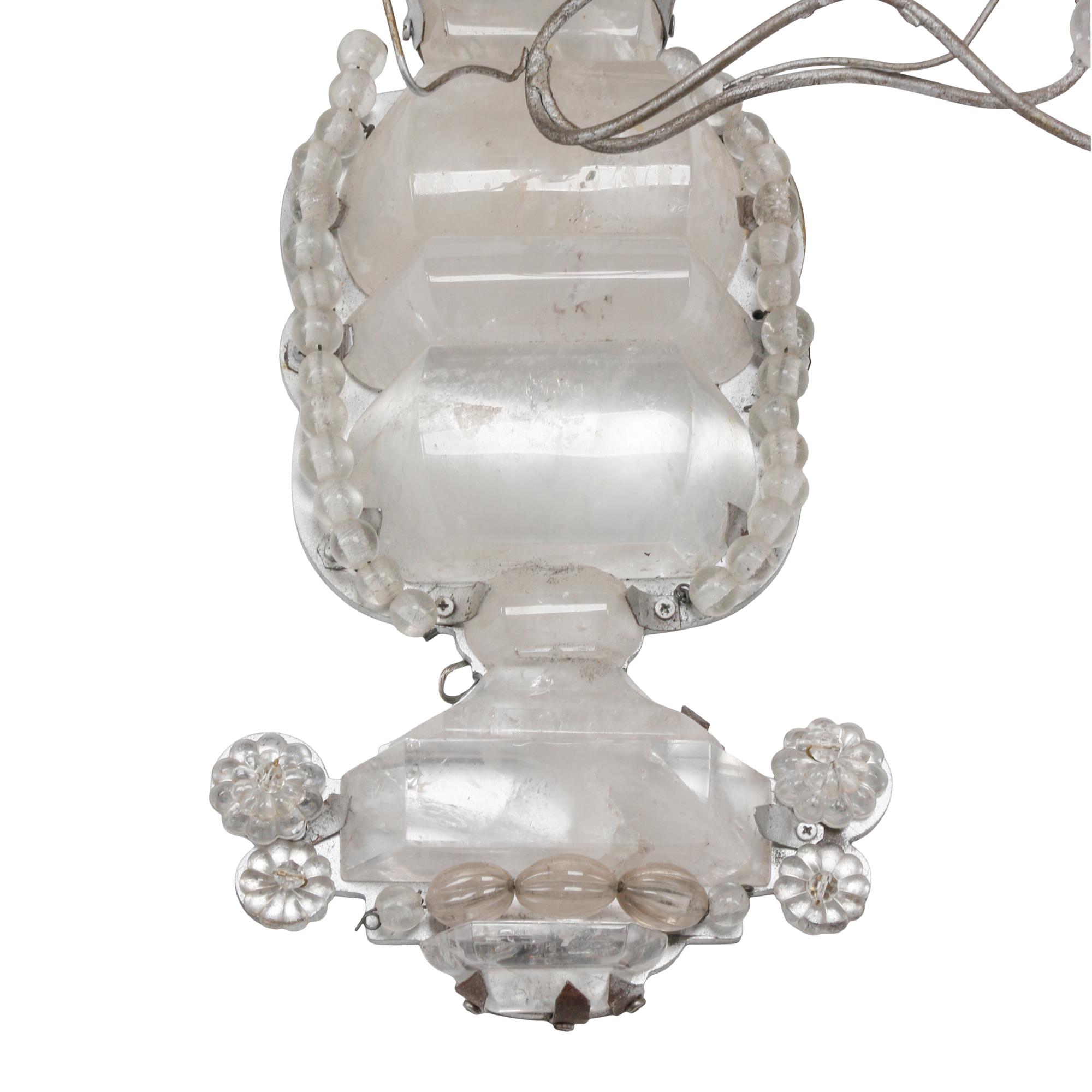 A Set of Four Régence Style Silvered Metal and Rock Crystal Five-Light Sconces