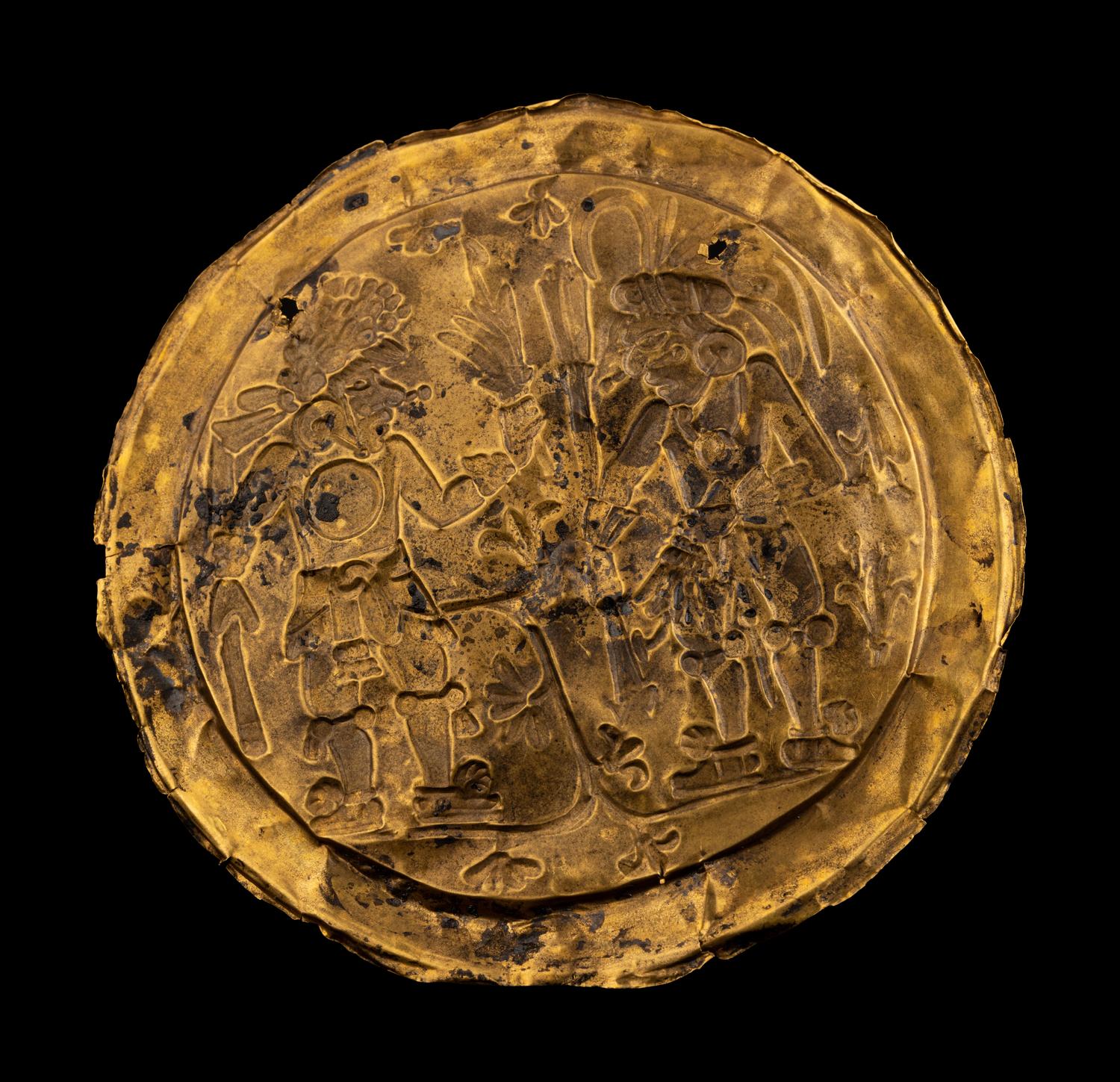 An Aztec or Toltec Gold Embossed Disc