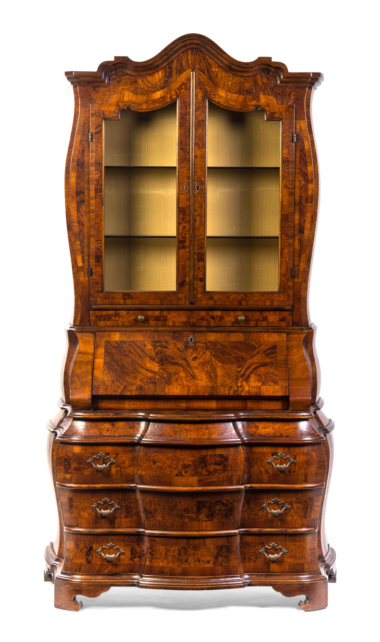 A Continental Burlwood Secretary Bookcase, Height 84 x width 47 x depth 20 inches.