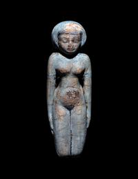 An Egyptian Faience Female Figure