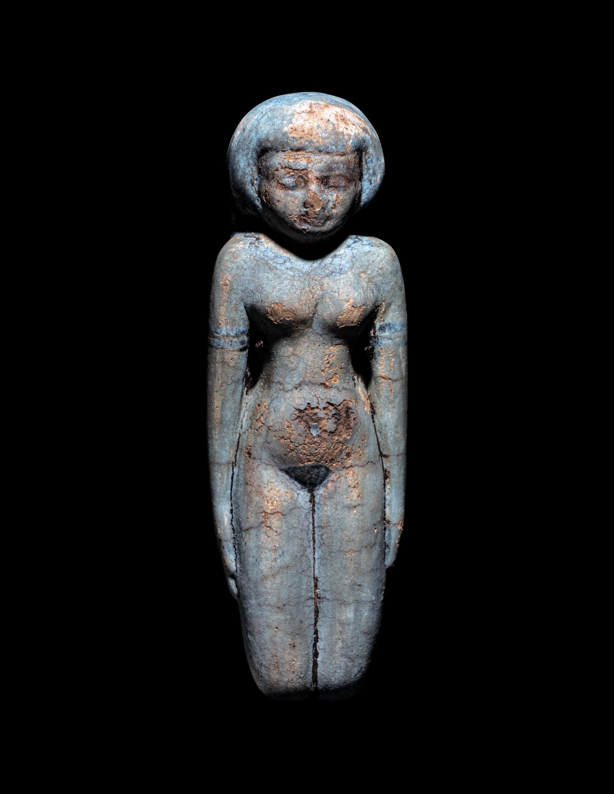 An Egyptian Faience Female Figure