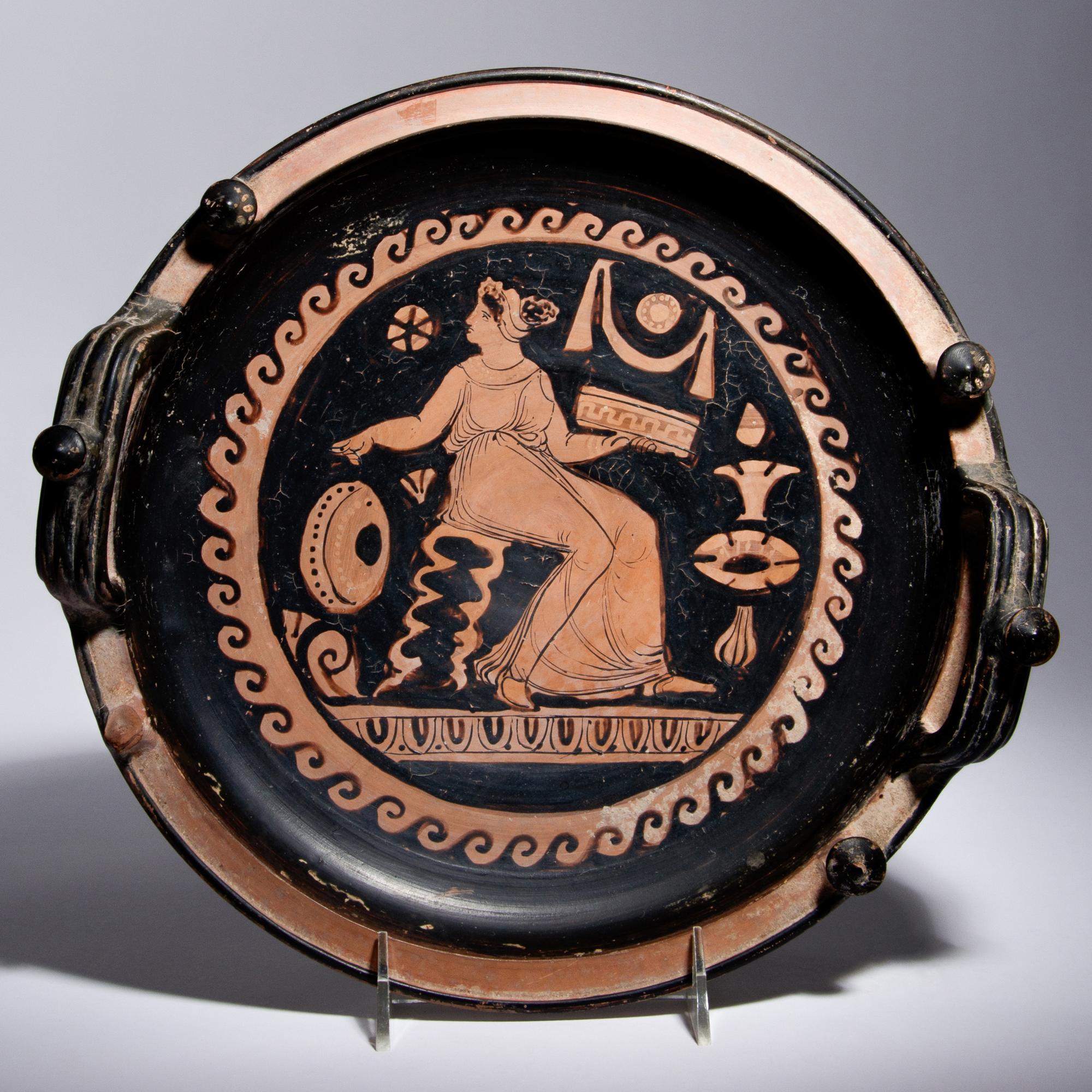 An Apulian Red-Figured Knob-Handled Patera