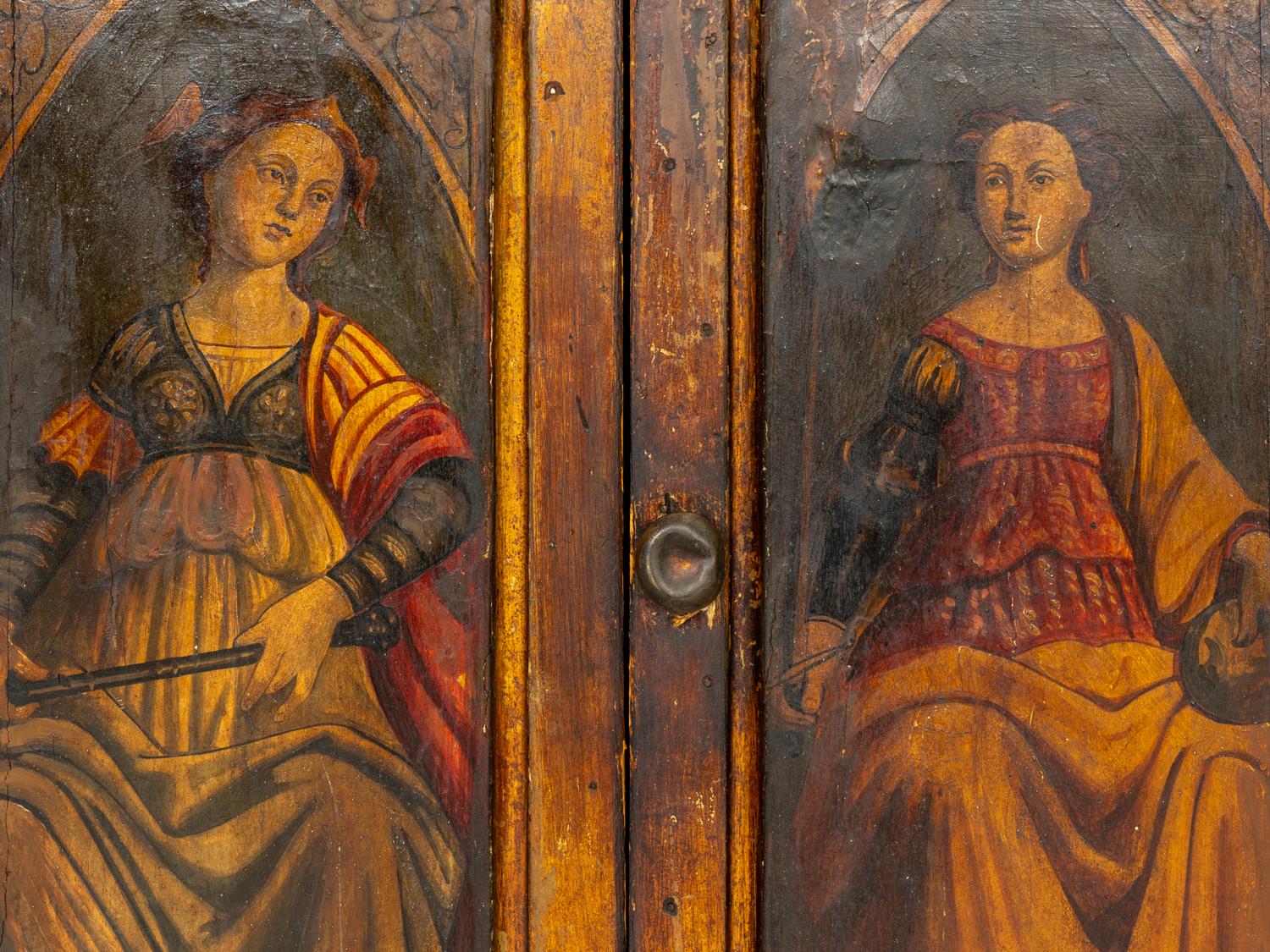 A Florentine Painted and Parcel Gilt Cabinet with Gesso Pastiglia Panels