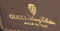 A Gucci Monogram Canvas Wallet, 7.5" x 4.5".