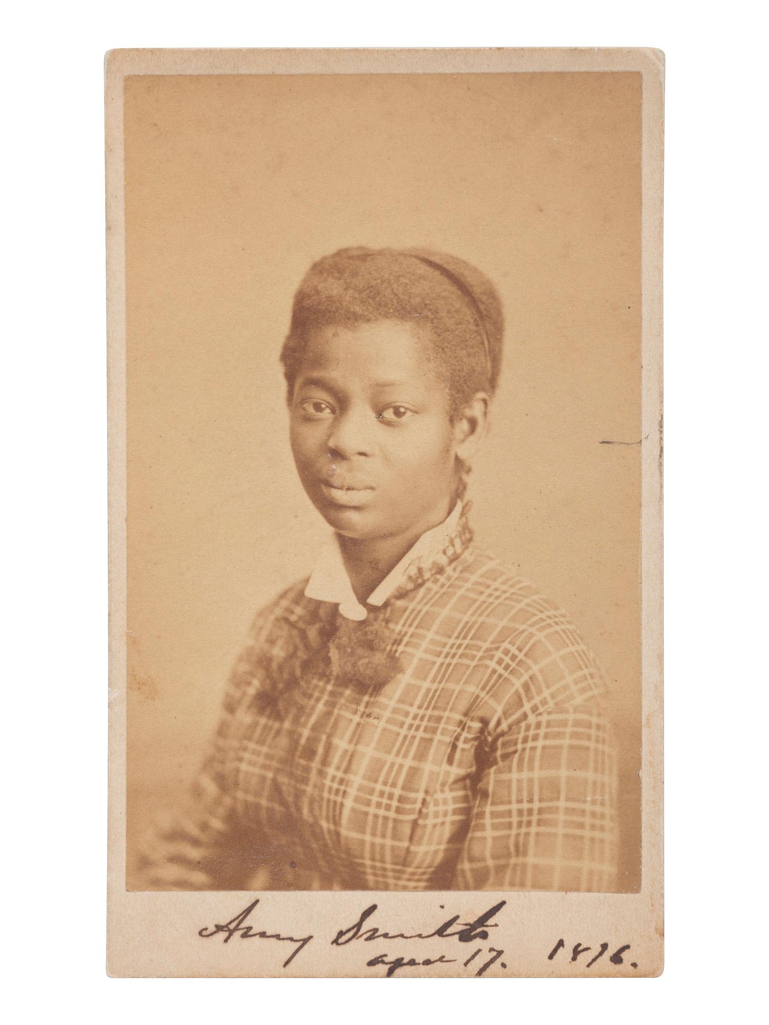 [EARLY PHOTOGRAPHY]. REIMER, B.F., photographer. CDV of identified African American woman, Amy Smith. Philadelphia, PA, [1876].