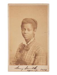 [EARLY PHOTOGRAPHY]. REIMER, B.F., photographer. CDV of identified African American woman, Amy Smith. Philadelphia, PA, [1876].