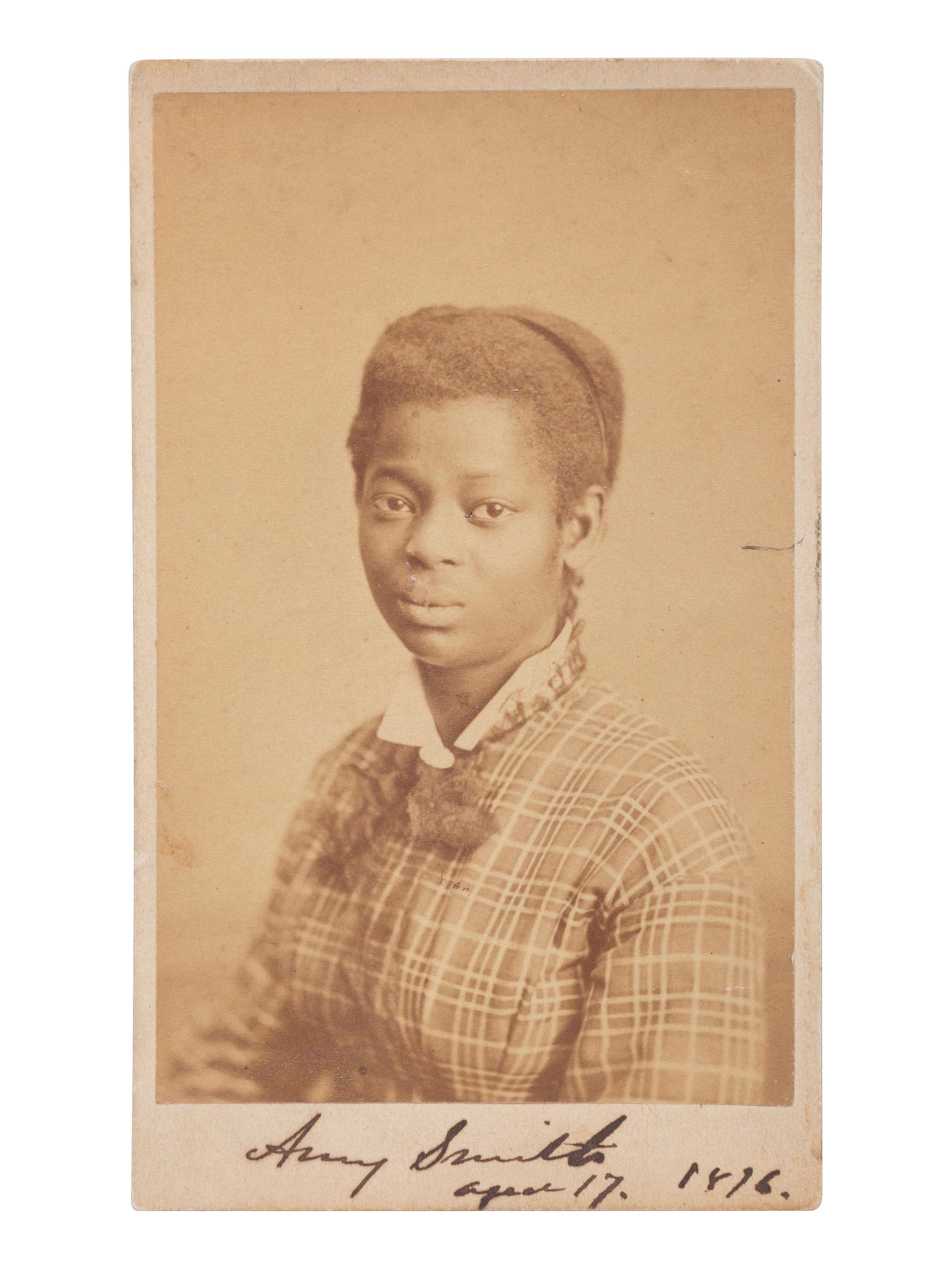 [EARLY PHOTOGRAPHY]. REIMER, B.F., photographer. CDV of identified African American woman, Amy Smith. Philadelphia, PA, [1876].