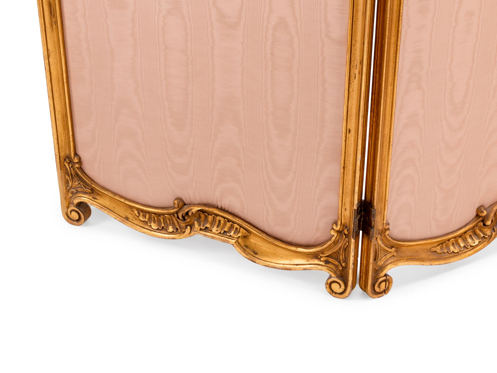 A French Carved Giltwood, Upholstery and Mirror Screen