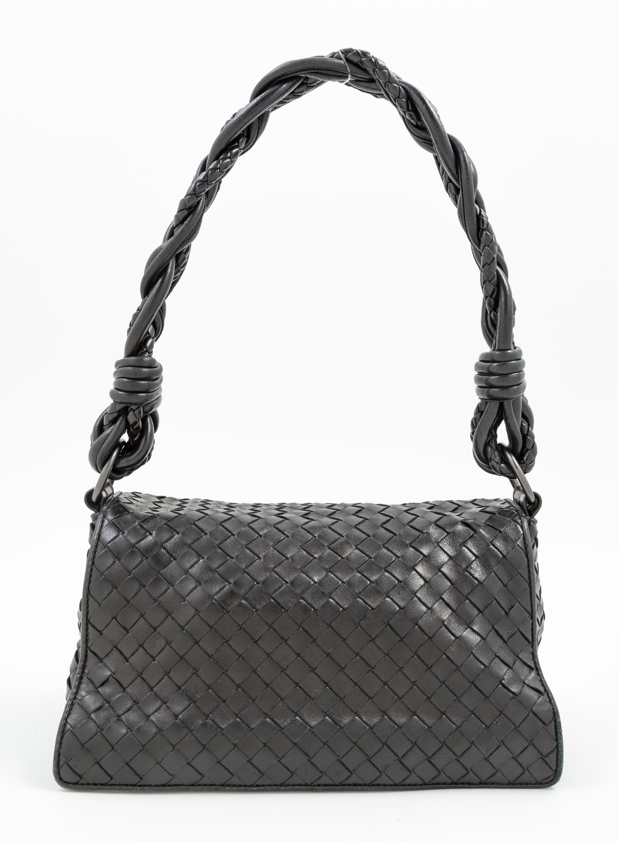 A Bottega Veneta Black Intrecciato Double Flap Handbag, 10" x 5" x 4"; Strap drop: 9".
