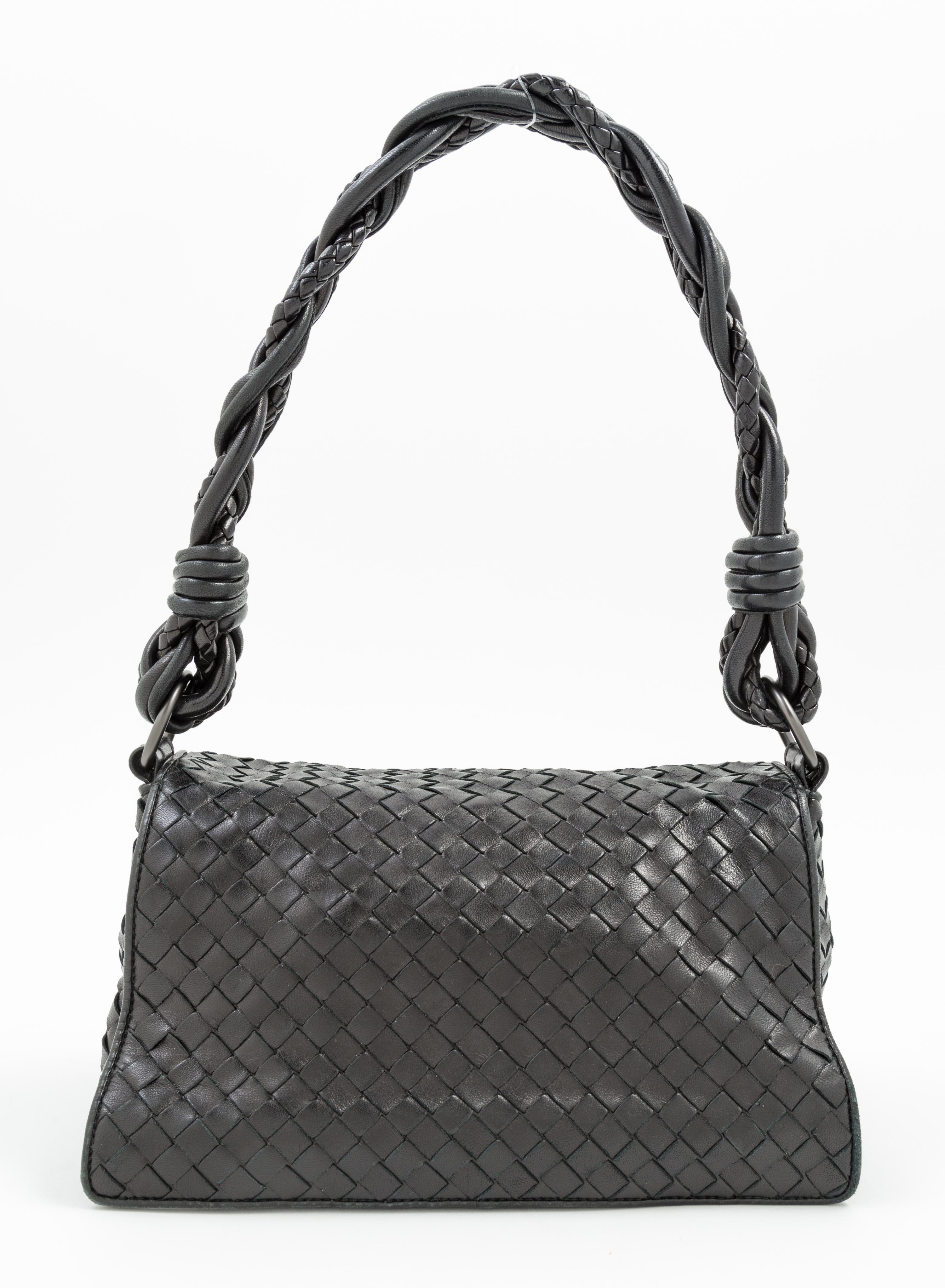 A Bottega Veneta Black Intrecciato Double Flap Handbag, 10" x 5" x 4"; Strap drop: 9".