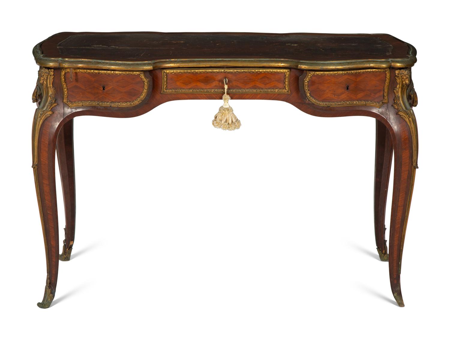 A Louis XV Style Gilt Bronze Mounted Parquetry Bureau Plat