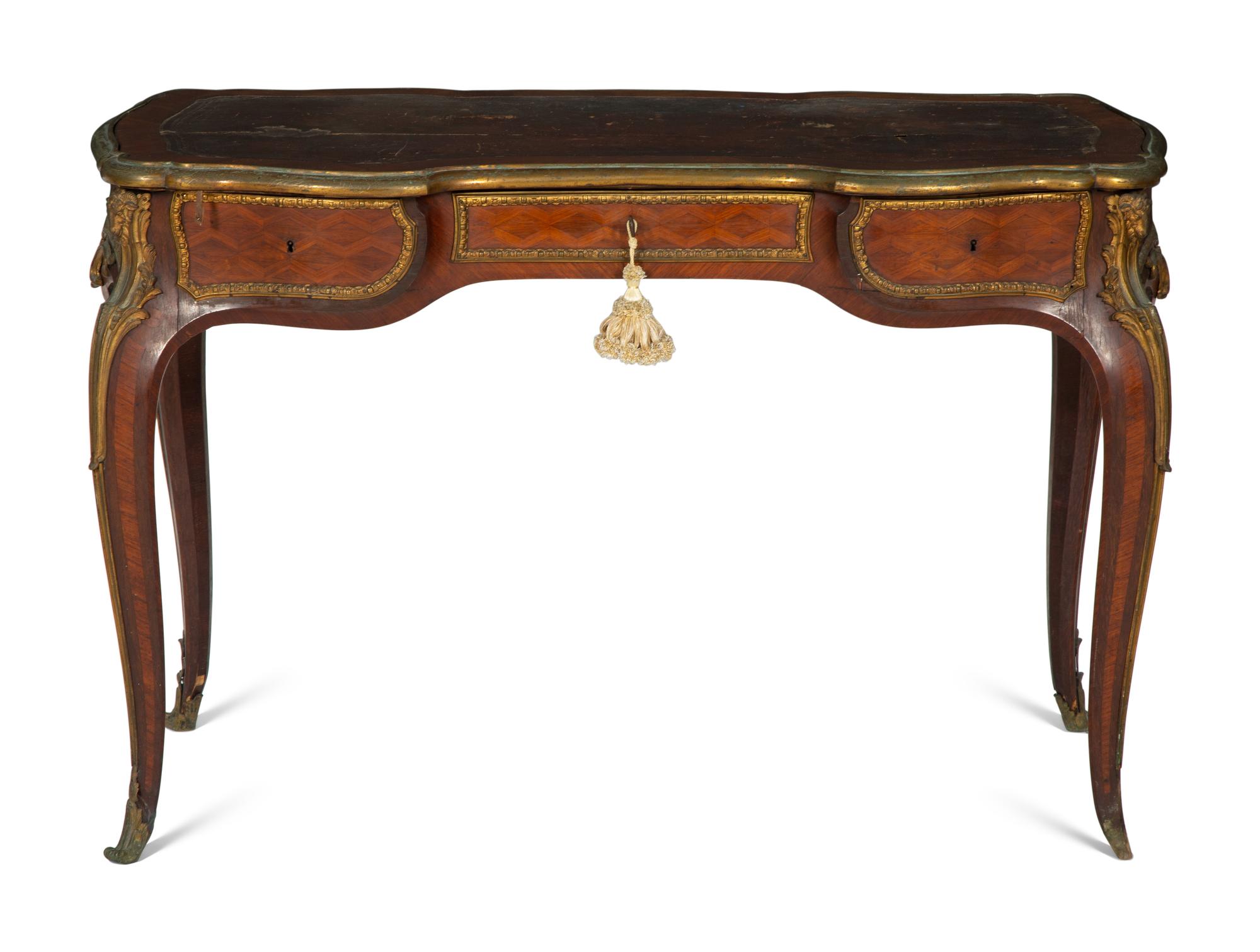A Louis XV Style Gilt Bronze Mounted Parquetry Bureau Plat