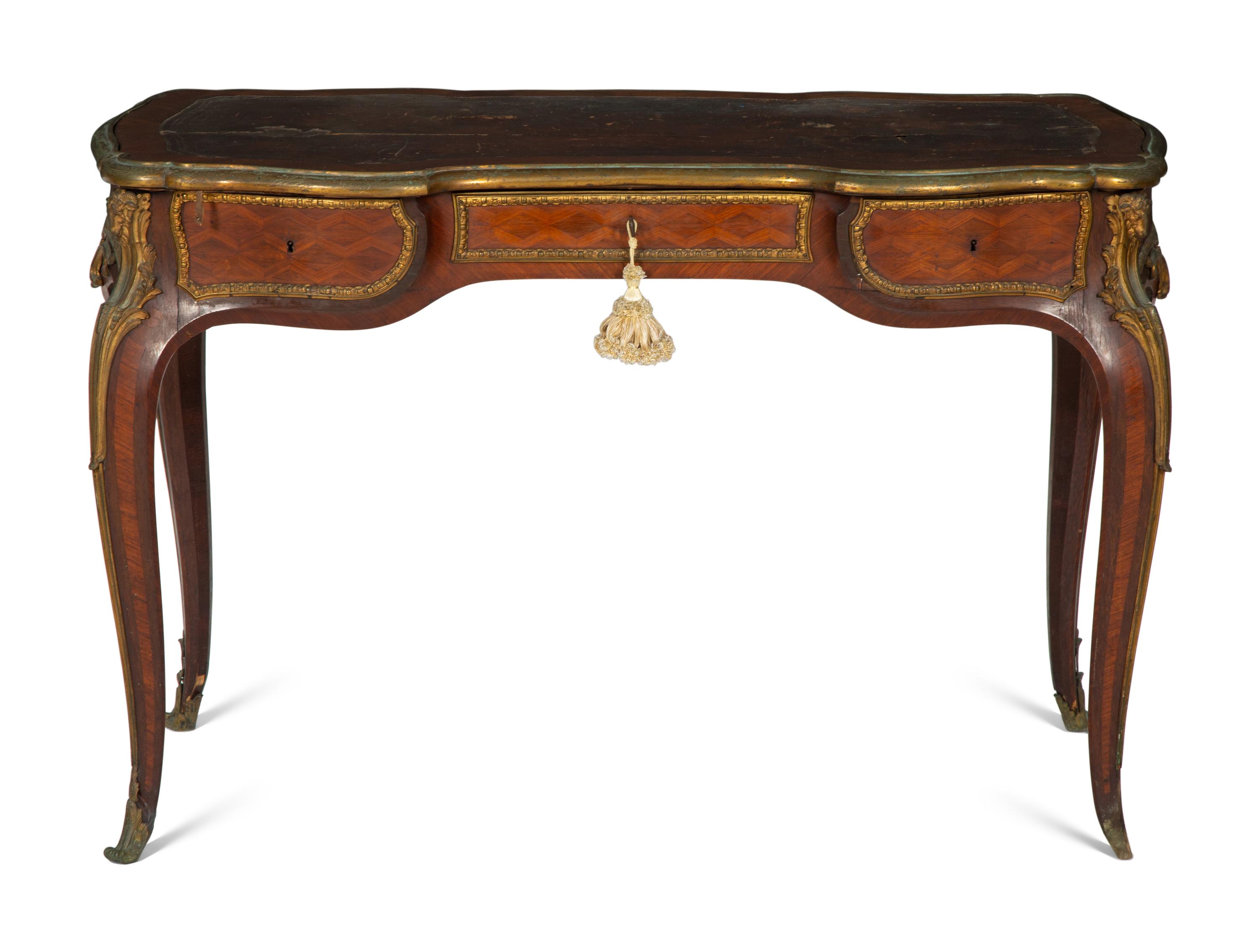 A Louis XV Style Gilt Bronze Mounted Parquetry Bureau Plat