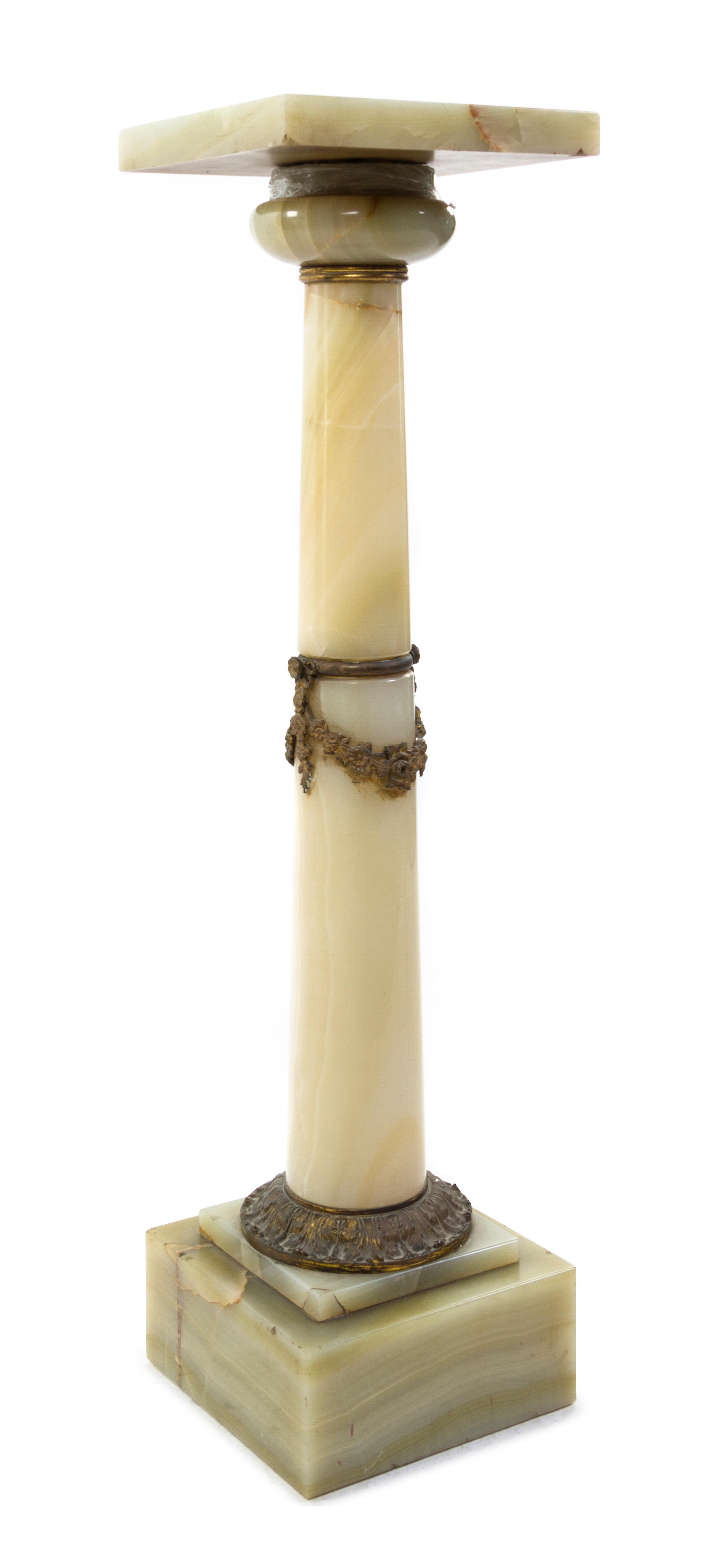 A Neoclassical Gilt Bronze Mounted Onyx Column, Height 38 1/2 inches.