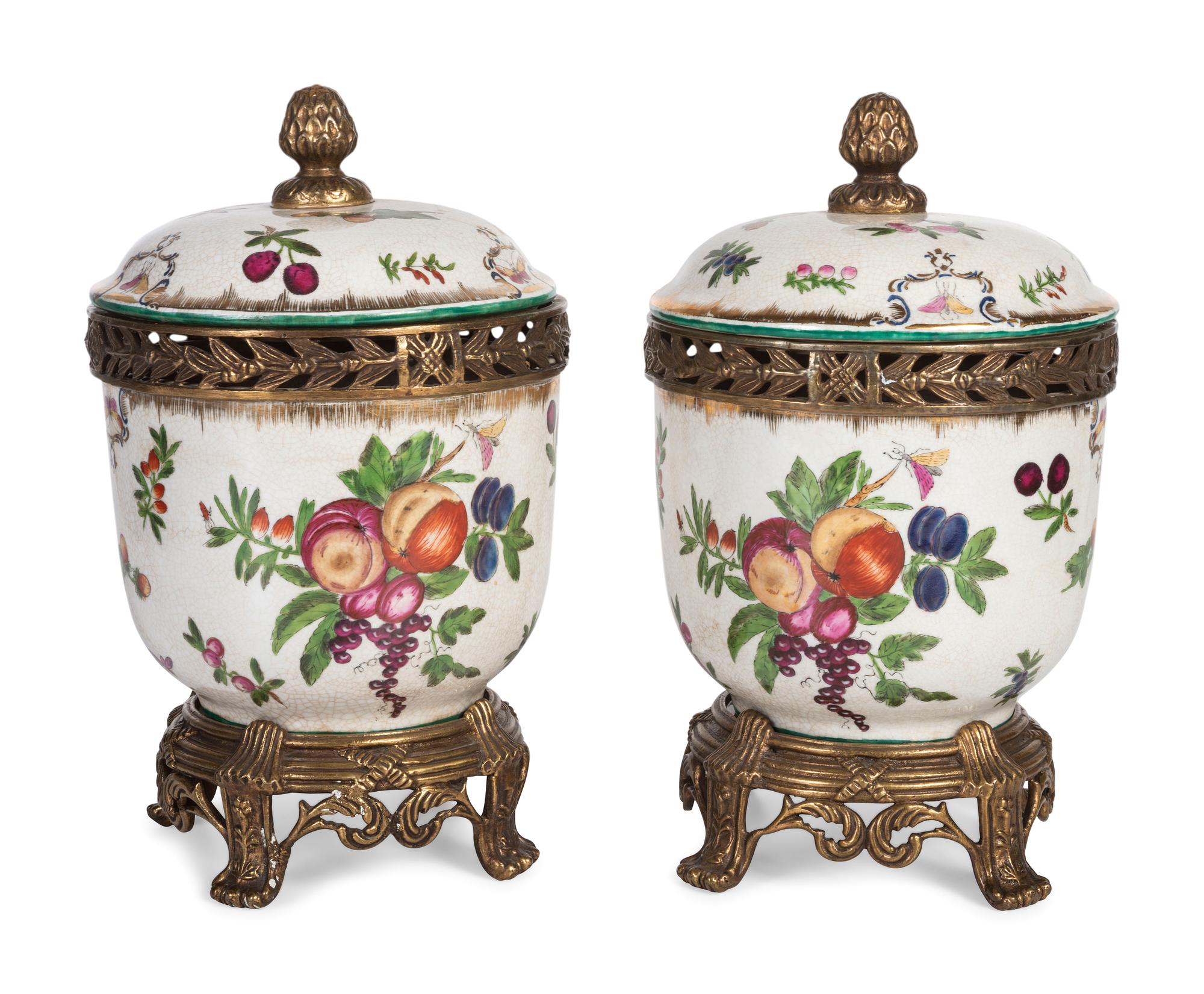 A Pair of United Wilson Gilt Metal Mounted Porcelain Urns
