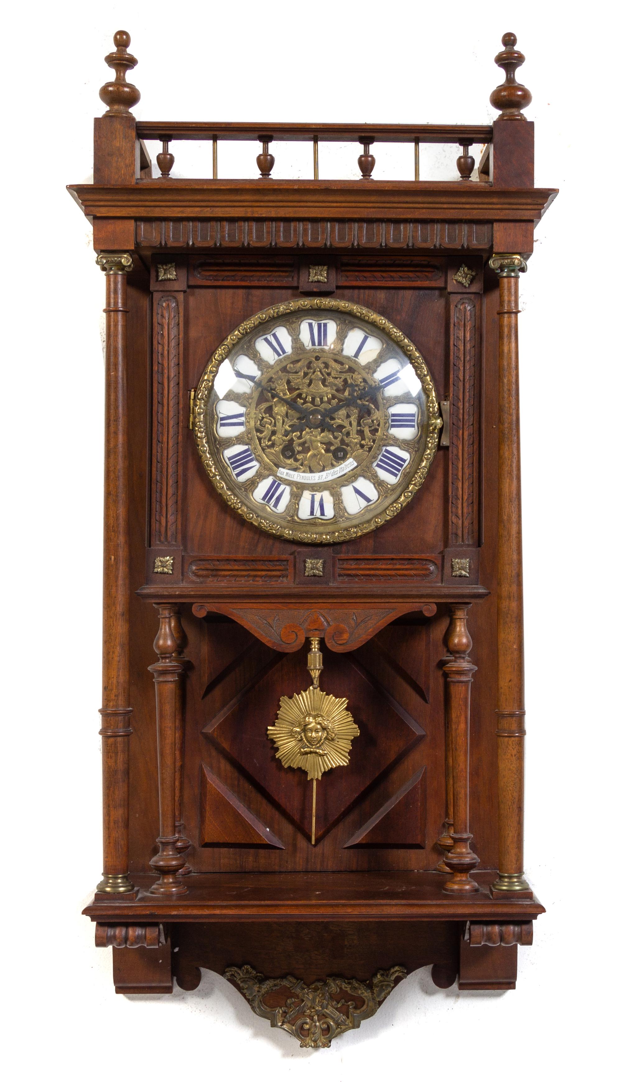 A French Walnut Wall Clock Height 35 1/2 inches. — LATE 19TH/EARLY 20TH CENTURY