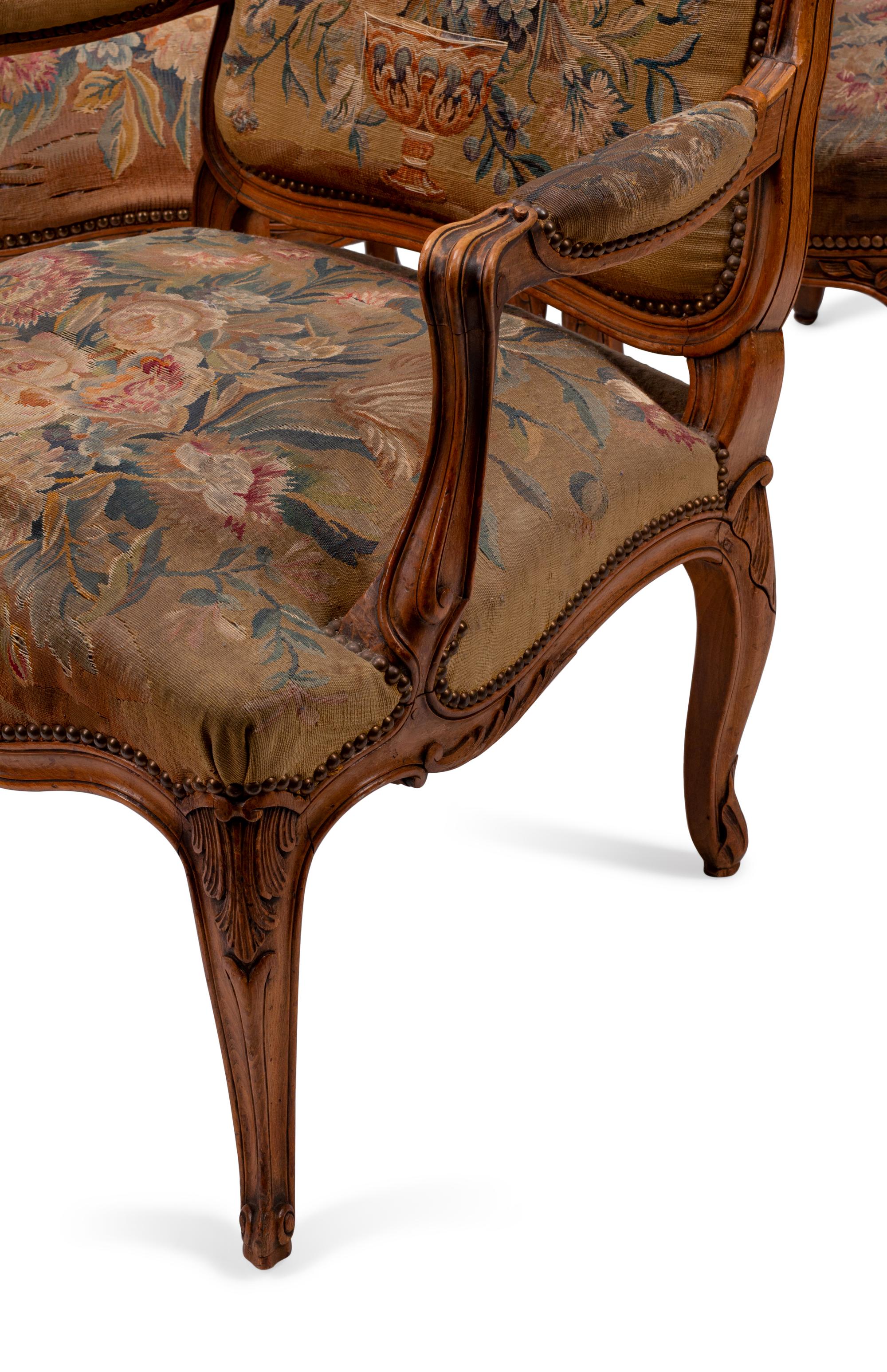 A Set of Four Louis XV Beechwood Fauteuils with Tapestry Upholstery