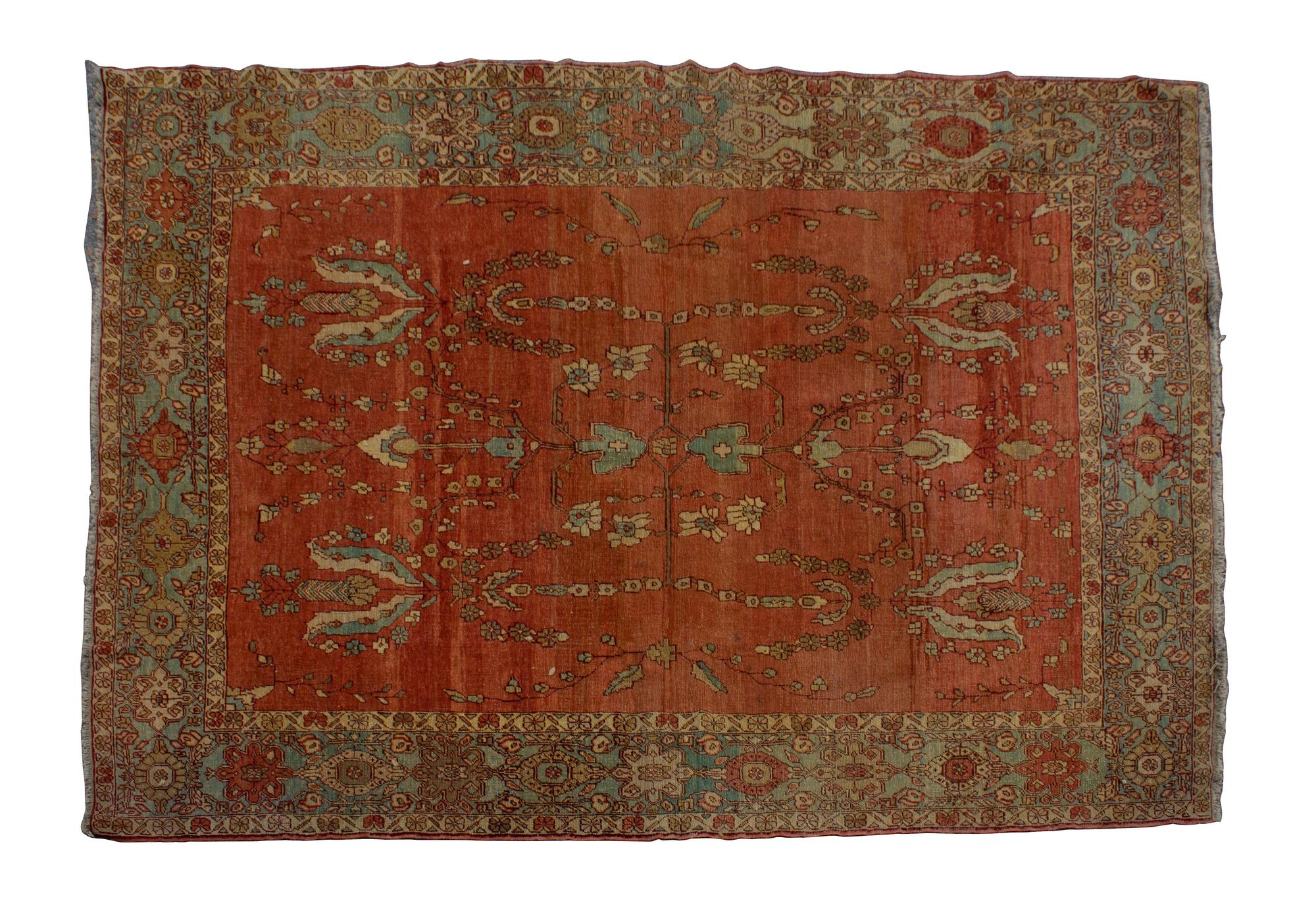 A Turkish Wool Rug — 20TH CENTURY
