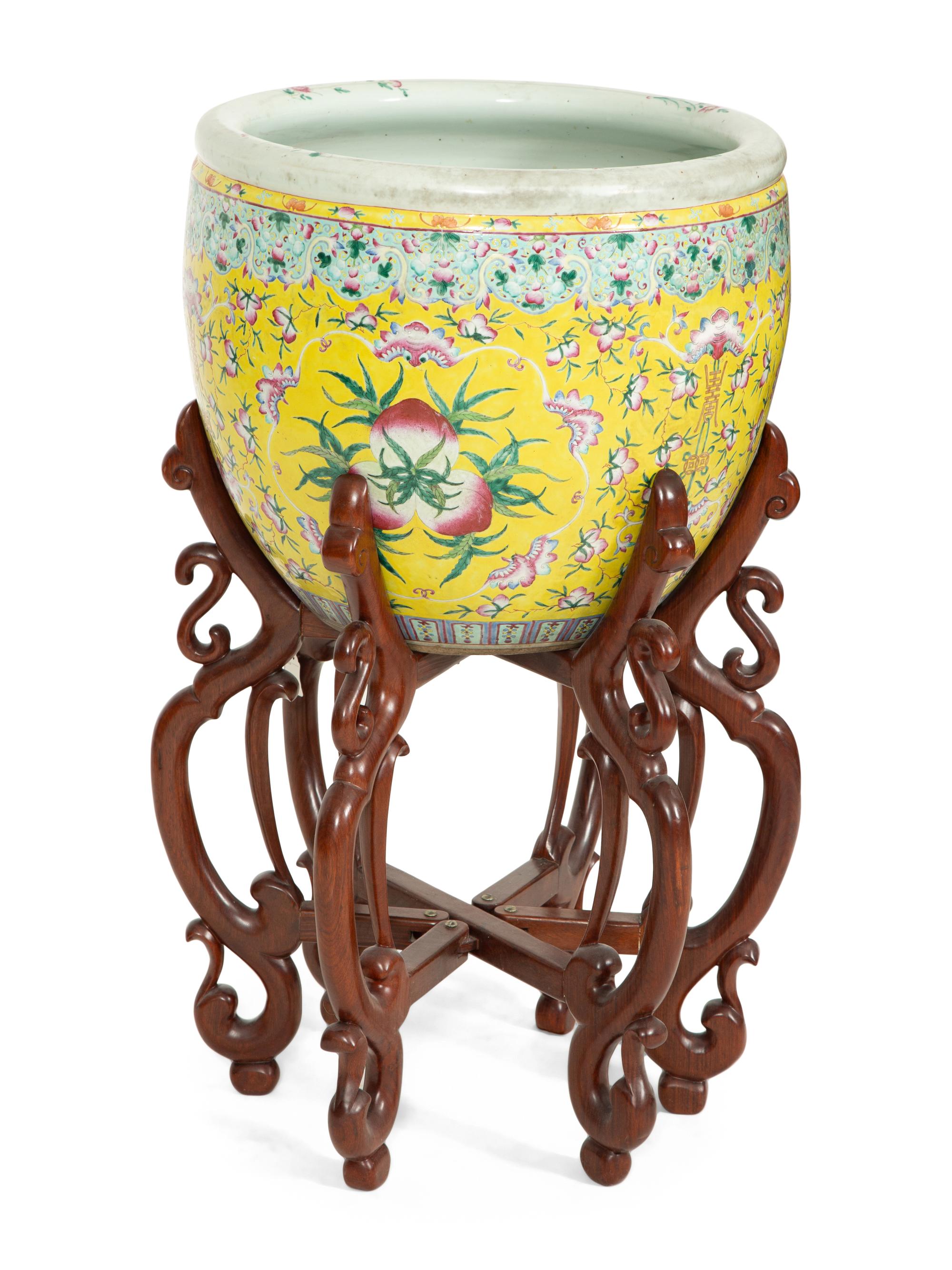 A Chinese Export Famille Jaune Jardinière on a Hardwood Stand