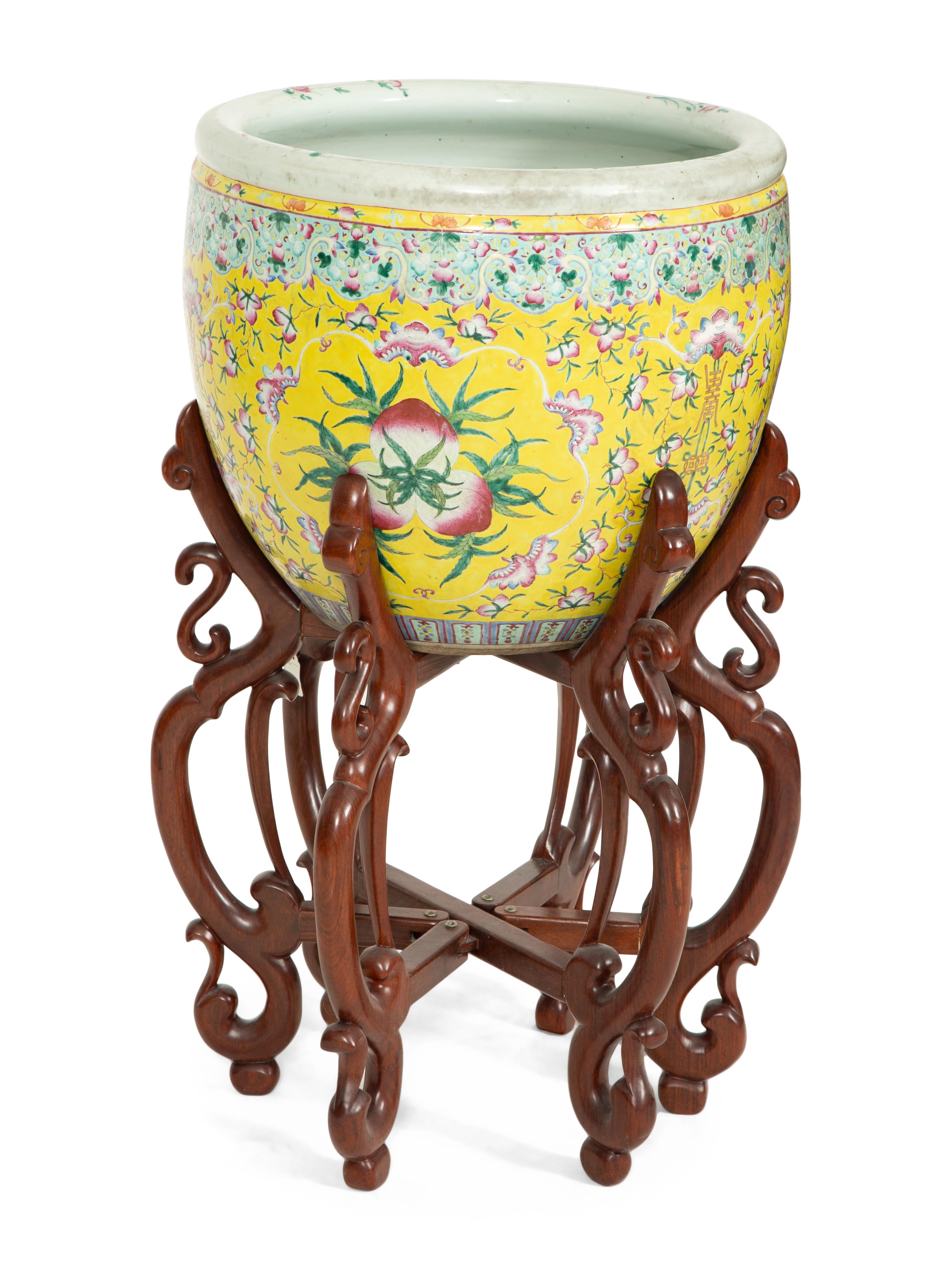 A Chinese Export Famille Jaune Jardinière on a Hardwood Stand